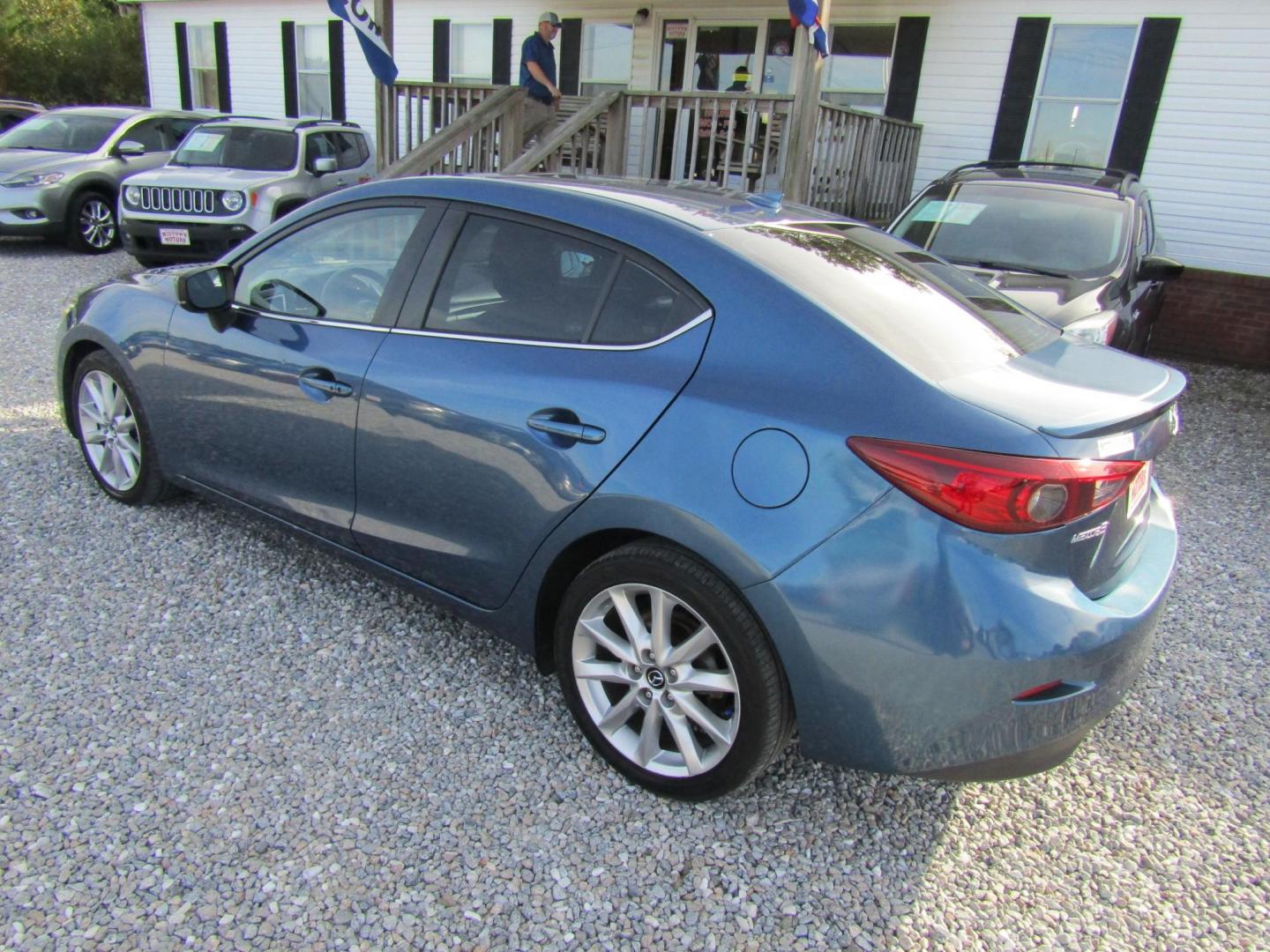 2017 Blue Mazda MAZDA3 s Grand Touring AT 4-Door (JM1BN1W31H1) with an 2.5L L4 DOHC 16V engine, Automatic transmission, located at 15016 S Hwy 231, Midland City, AL, 36350, (334) 983-3001, 31.306210, -85.495277 - Photo#5