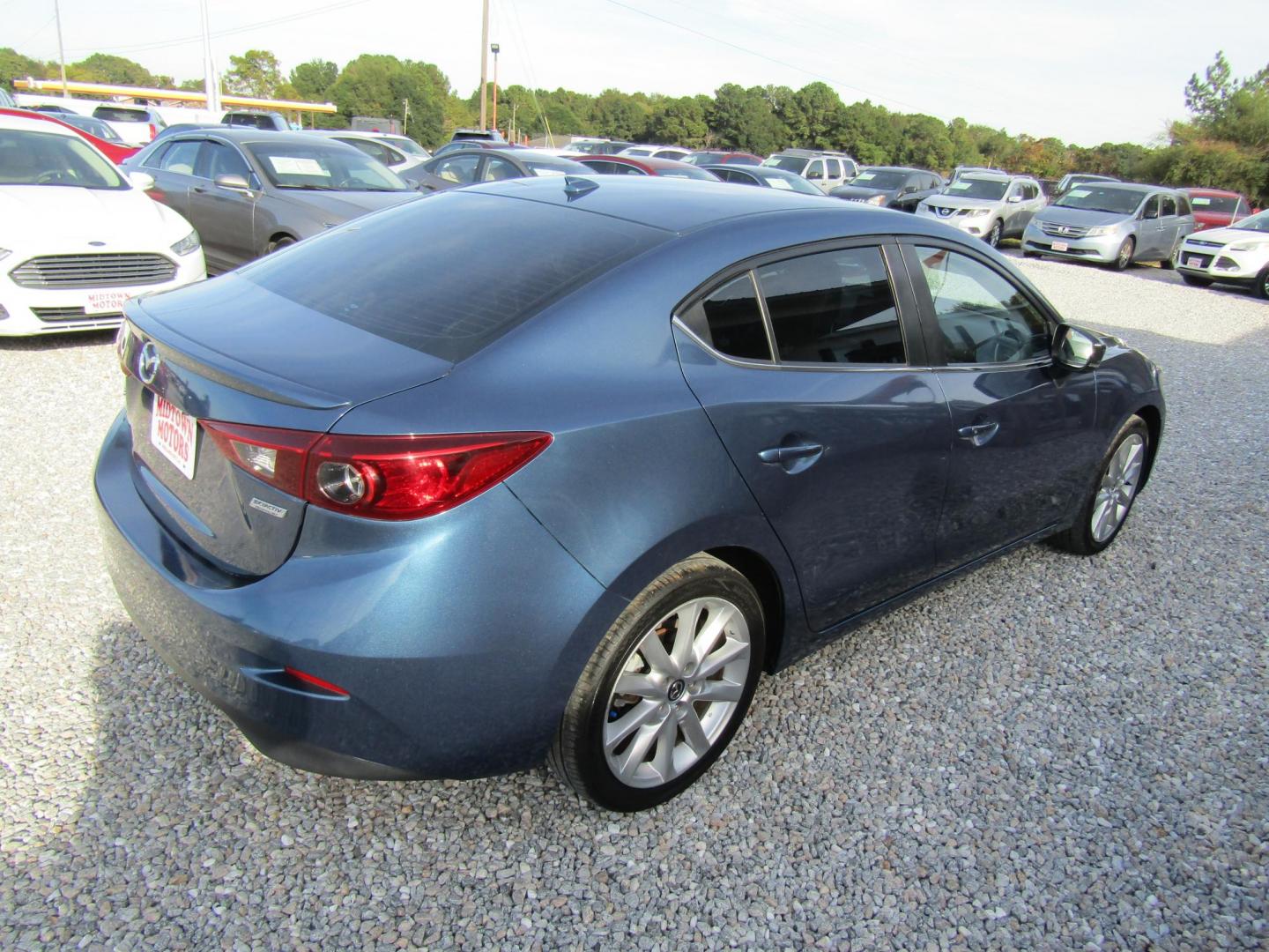 2017 Blue Mazda MAZDA3 s Grand Touring AT 4-Door (JM1BN1W31H1) with an 2.5L L4 DOHC 16V engine, Automatic transmission, located at 15016 S Hwy 231, Midland City, AL, 36350, (334) 983-3001, 31.306210, -85.495277 - Photo#7