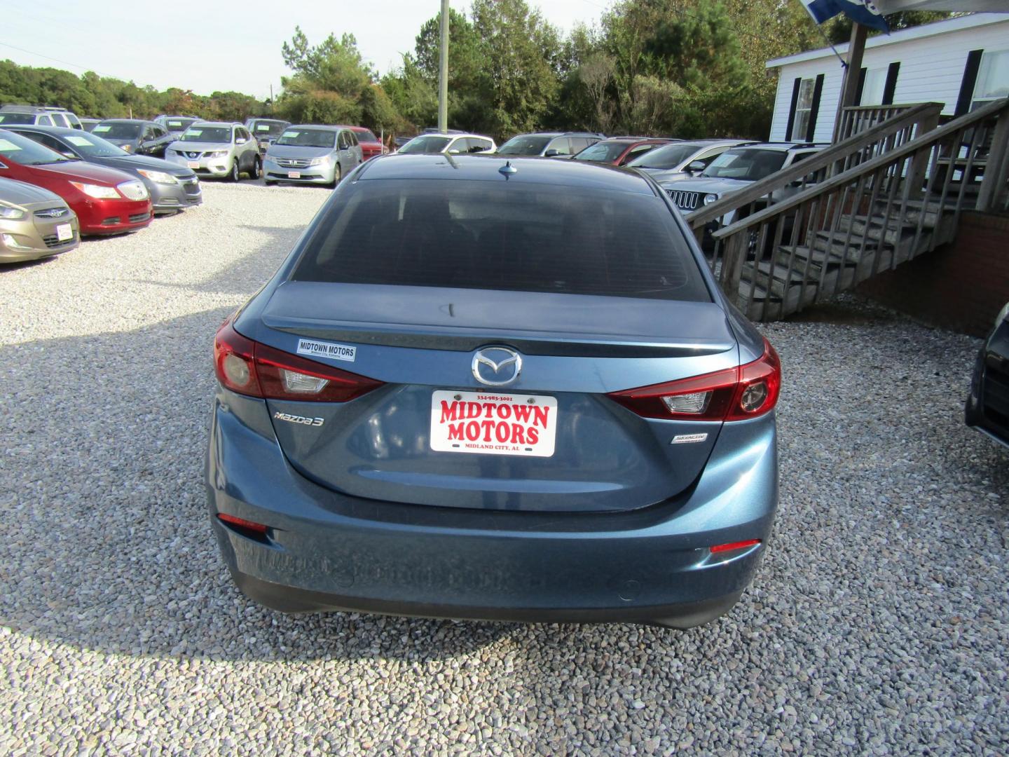 2017 Blue Mazda MAZDA3 s Grand Touring AT 4-Door (JM1BN1W31H1) with an 2.5L L4 DOHC 16V engine, Automatic transmission, located at 15016 S Hwy 231, Midland City, AL, 36350, (334) 983-3001, 31.306210, -85.495277 - Photo#6