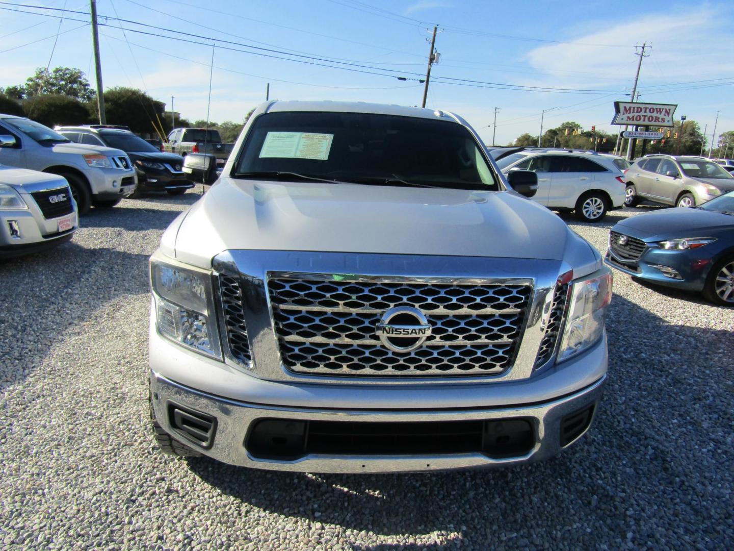 2018 Silver Nissan Titan Platinum Reserve Crew Cab 2WD (1N6AA1E61JN) with an 5.6L V8 DOHC 32V engine, Automatic transmission, located at 15016 S Hwy 231, Midland City, AL, 36350, (334) 983-3001, 31.306210, -85.495277 - Photo#1