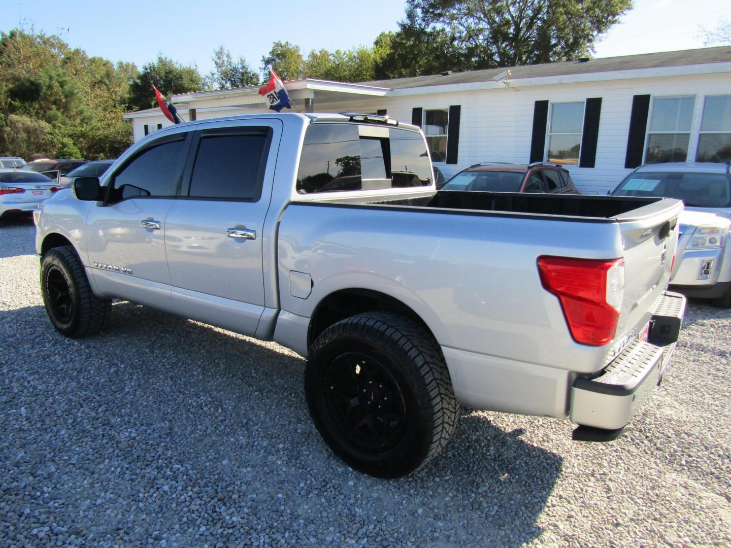 2018 Silver Nissan Titan Platinum Reserve Crew Cab 2WD (1N6AA1E61JN) with an 5.6L V8 DOHC 32V engine, Automatic transmission, located at 15016 S Hwy 231, Midland City, AL, 36350, (334) 983-3001, 31.306210, -85.495277 - Photo#5
