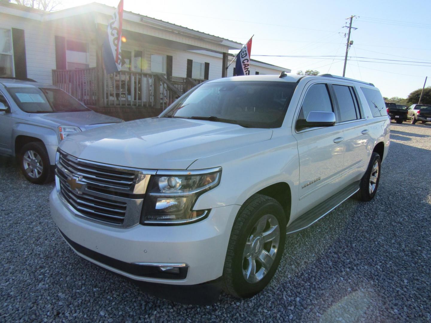 2015 White Chevrolet Suburban LTZ 1500 2WD (1GNSCKKC7FR) with an 5.3L V8 OHV 16V engine, Automatic transmission, located at 15016 S Hwy 231, Midland City, AL, 36350, (334) 983-3001, 31.306210, -85.495277 - Photo#2