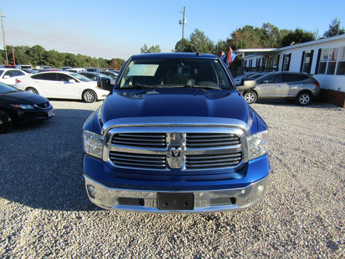 2017 Blue RAM 1500 SLT Crew Cab SWB 2WD (3C6RR6LT1HG) with an 5.7L V8 OHV 16V engine, Automatic transmission, located at 15016 S Hwy 231, Midland City, AL, 36350, (334) 983-3001, 31.306210, -85.495277 - Photo#1