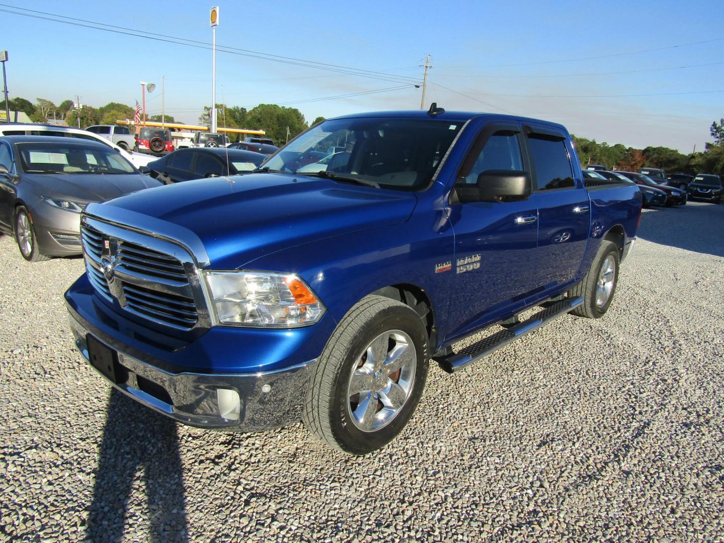 2017 Blue RAM 1500 SLT Crew Cab SWB 2WD (3C6RR6LT1HG) with an 5.7L V8 OHV 16V engine, Automatic transmission, located at 15016 S Hwy 231, Midland City, AL, 36350, (334) 983-3001, 31.306210, -85.495277 - Photo#2