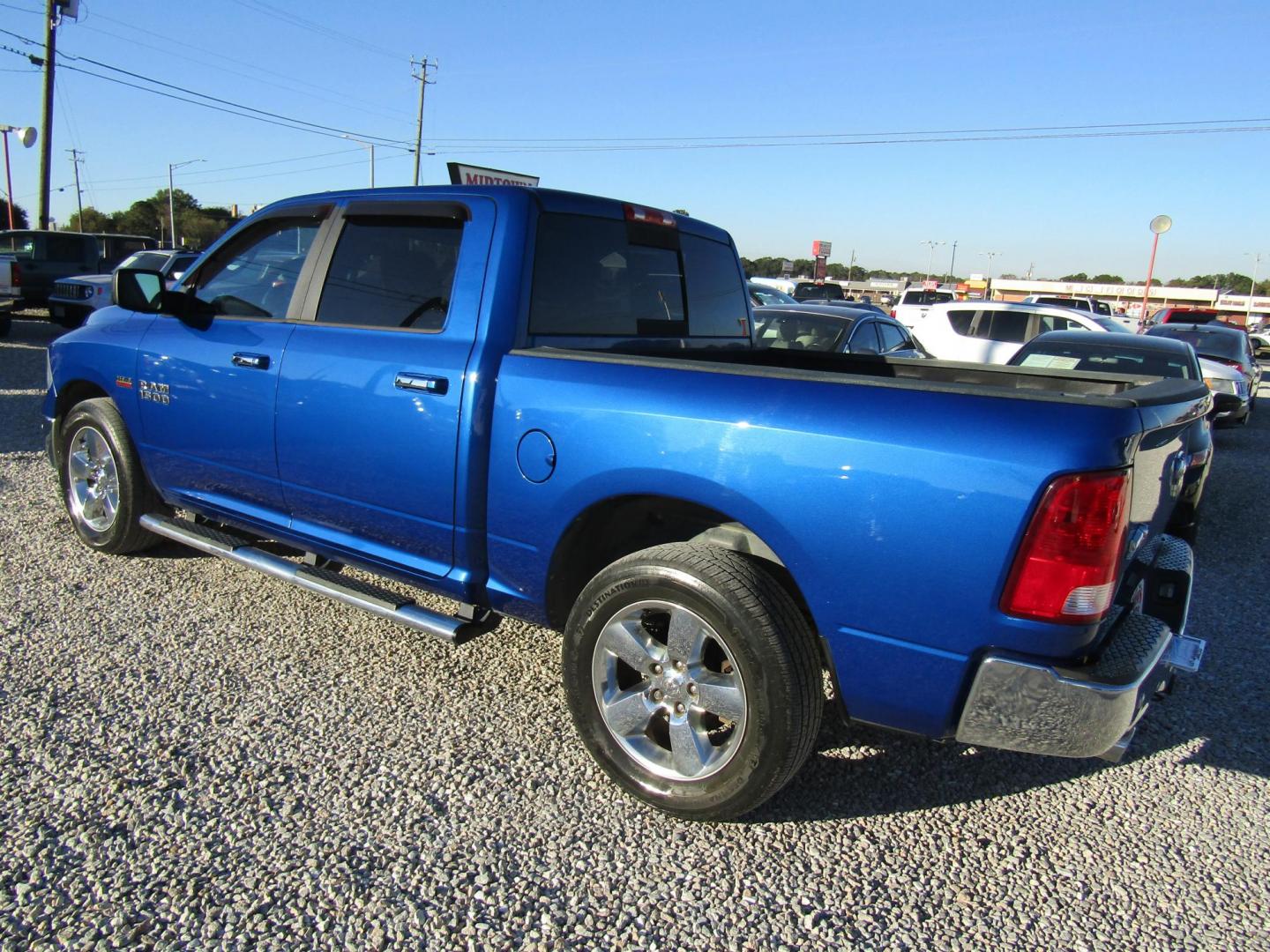 2017 Blue RAM 1500 SLT Crew Cab SWB 2WD (3C6RR6LT1HG) with an 5.7L V8 OHV 16V engine, Automatic transmission, located at 15016 S Hwy 231, Midland City, AL, 36350, (334) 983-3001, 31.306210, -85.495277 - Photo#5