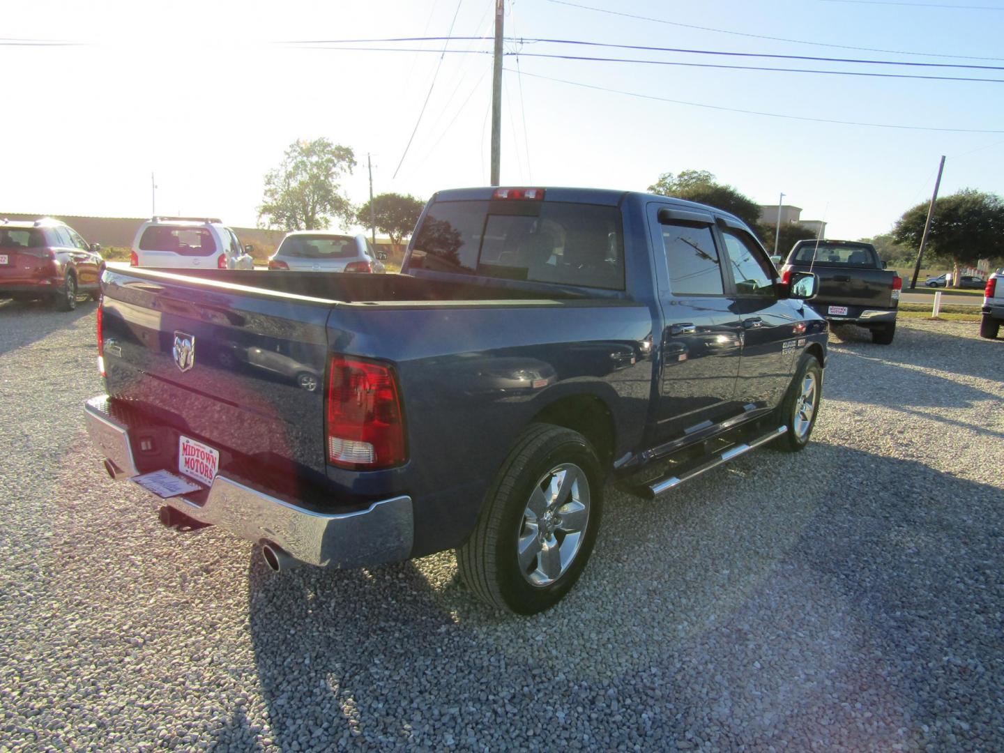 2017 Blue RAM 1500 SLT Crew Cab SWB 2WD (3C6RR6LT1HG) with an 5.7L V8 OHV 16V engine, Automatic transmission, located at 15016 S Hwy 231, Midland City, AL, 36350, (334) 983-3001, 31.306210, -85.495277 - Photo#7
