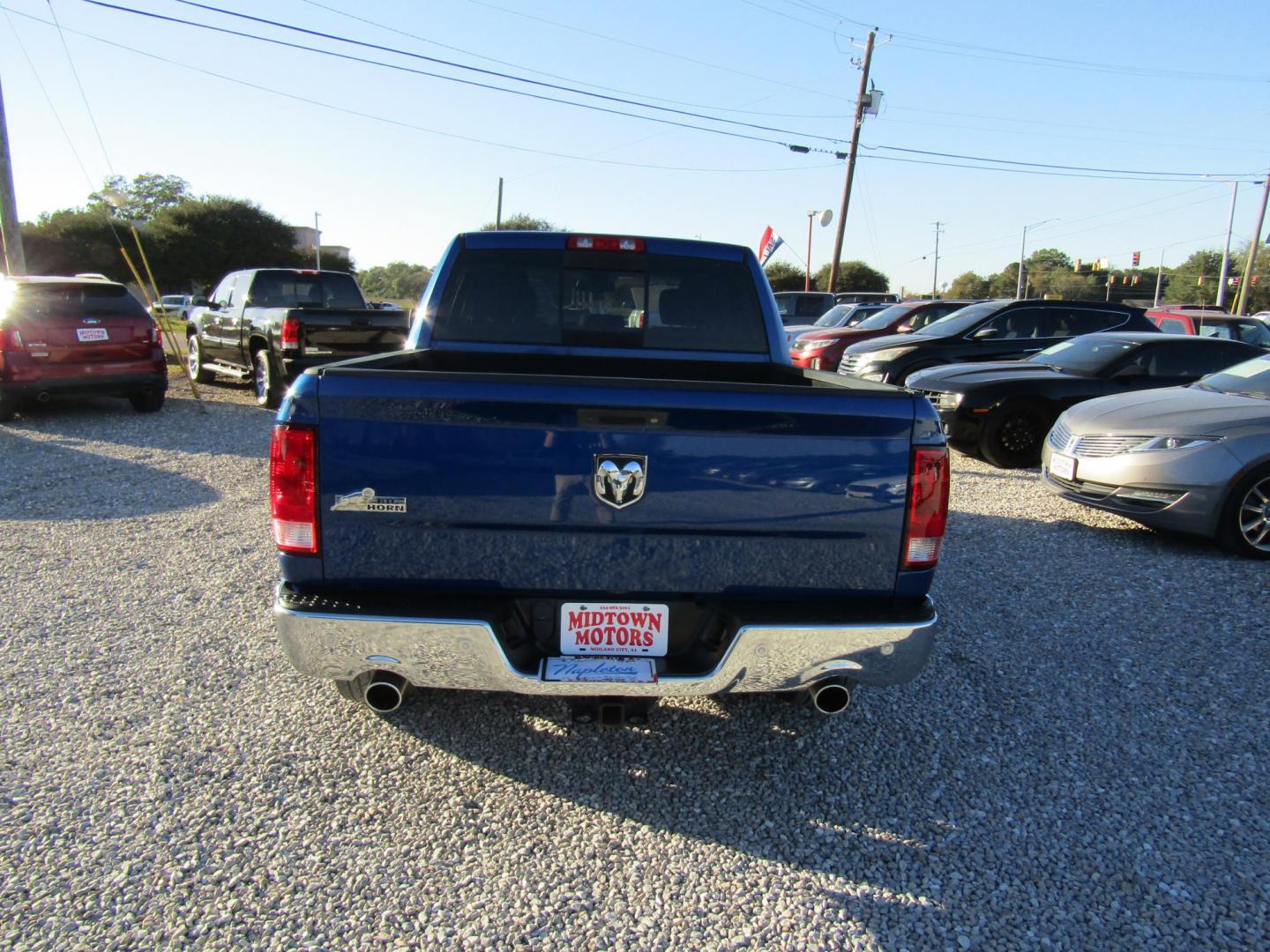 2017 Blue RAM 1500 SLT Crew Cab SWB 2WD (3C6RR6LT1HG) with an 5.7L V8 OHV 16V engine, Automatic transmission, located at 15016 S Hwy 231, Midland City, AL, 36350, (334) 983-3001, 31.306210, -85.495277 - Photo#6