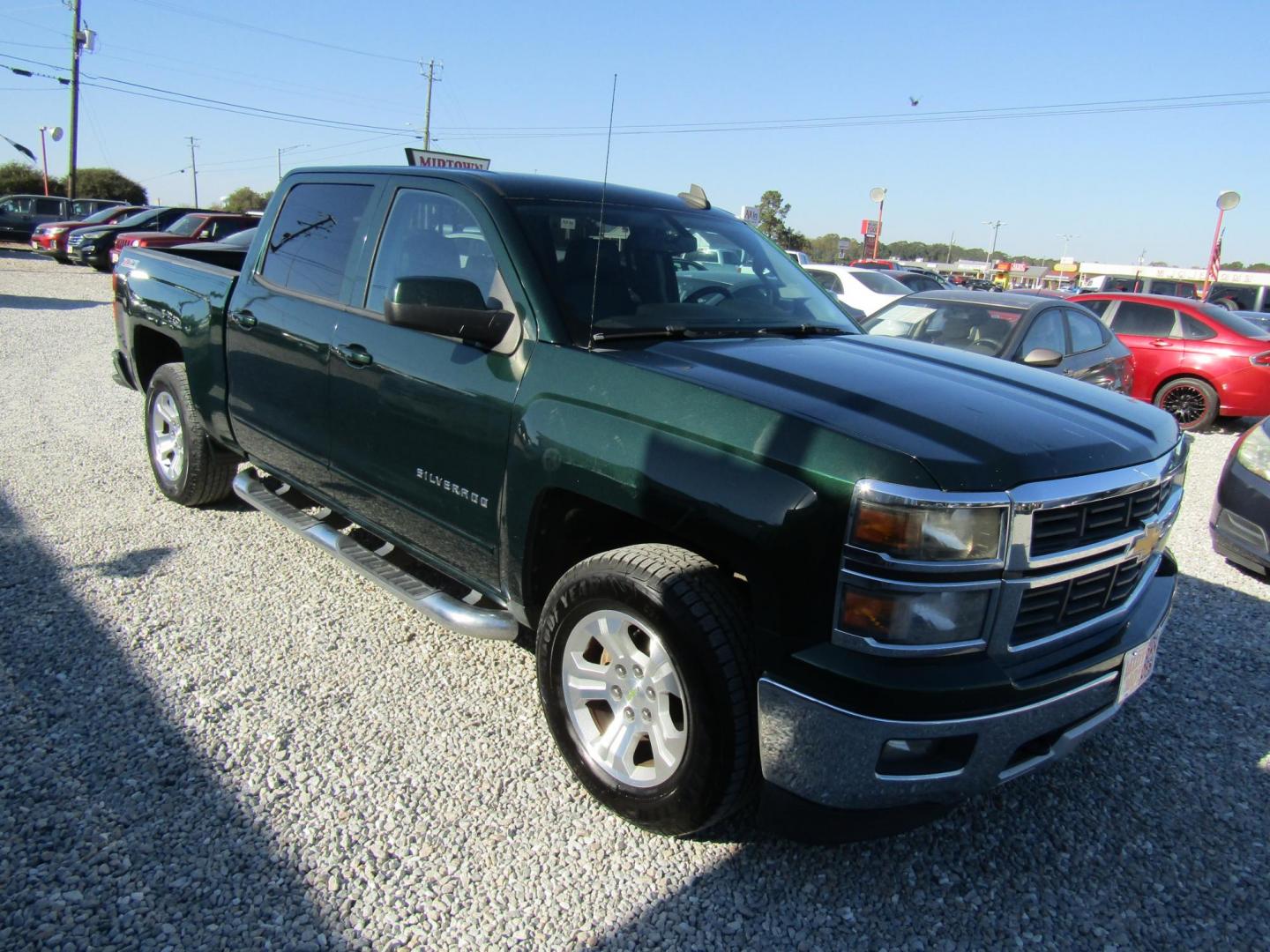 2015 GREEN Chevrolet Silverado 1500 LT Crew Cab 4WD (3GCUKREC0FG) with an 5.3L V8 OHV 16V engine, Automatic transmission, located at 15016 S Hwy 231, Midland City, AL, 36350, (334) 983-3001, 31.306210, -85.495277 - Photo#0