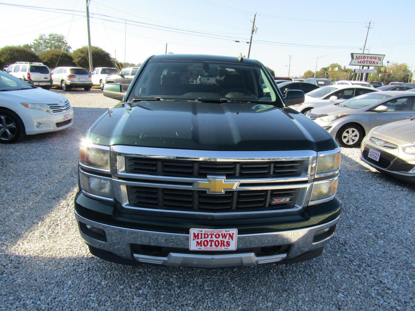 2015 GREEN Chevrolet Silverado 1500 LT Crew Cab 4WD (3GCUKREC0FG) with an 5.3L V8 OHV 16V engine, Automatic transmission, located at 15016 S Hwy 231, Midland City, AL, 36350, (334) 983-3001, 31.306210, -85.495277 - Photo#1