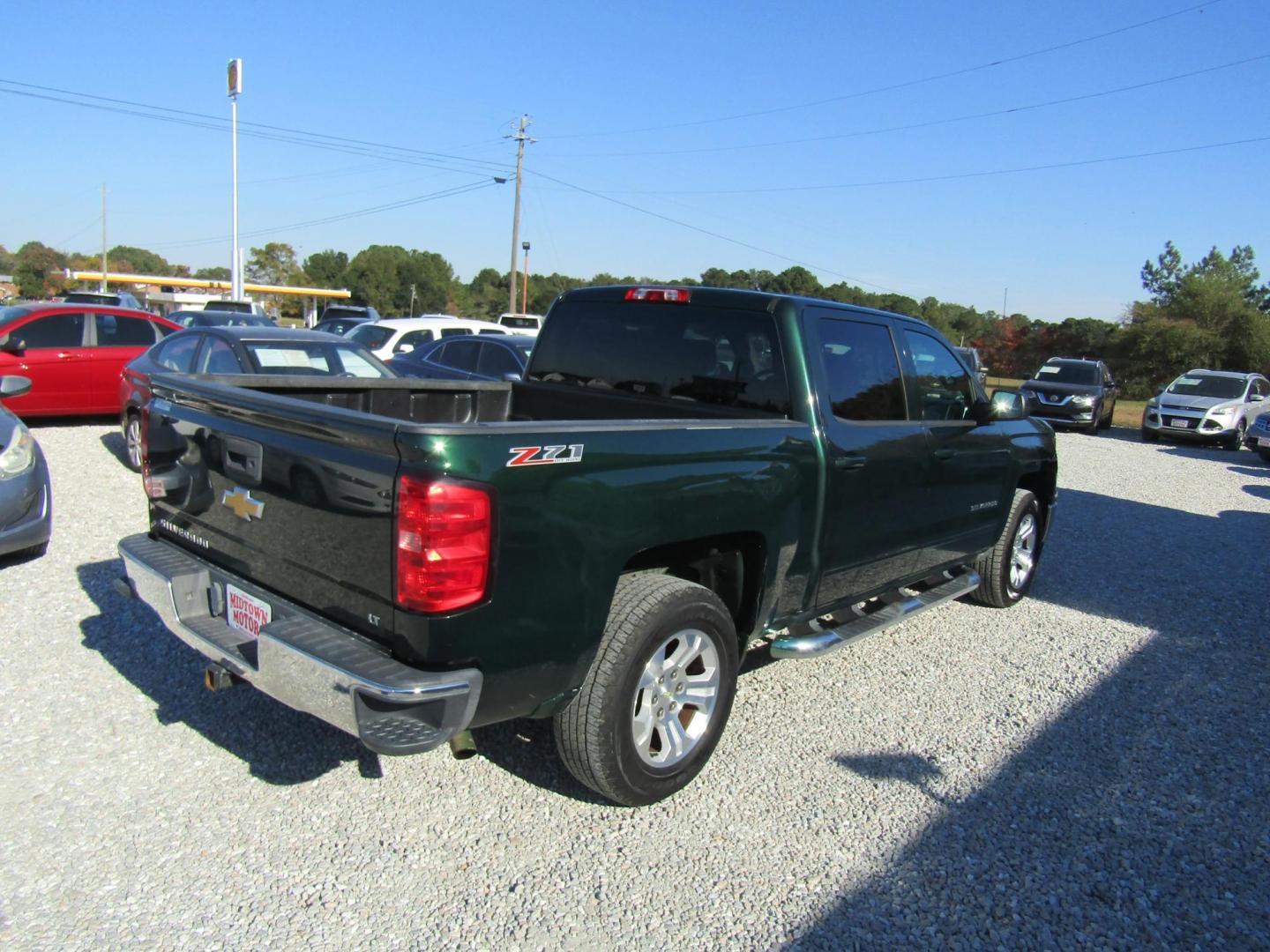 2015 GREEN Chevrolet Silverado 1500 LT Crew Cab 4WD (3GCUKREC0FG) with an 5.3L V8 OHV 16V engine, Automatic transmission, located at 15016 S Hwy 231, Midland City, AL, 36350, (334) 983-3001, 31.306210, -85.495277 - Photo#7