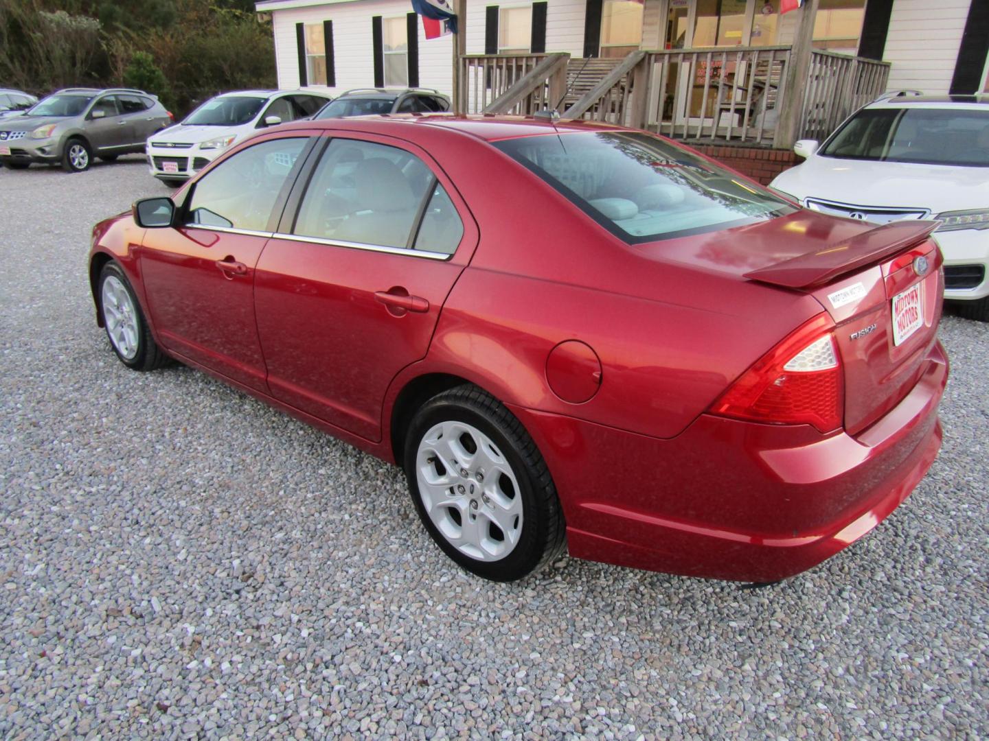 2011 Red Ford Fusion I4 SEL (3FAHP0JA9BR) with an 2.5L L4 DOHC 16V engine, Automatic transmission, located at 15016 S Hwy 231, Midland City, AL, 36350, (334) 983-3001, 31.306210, -85.495277 - Photo#5