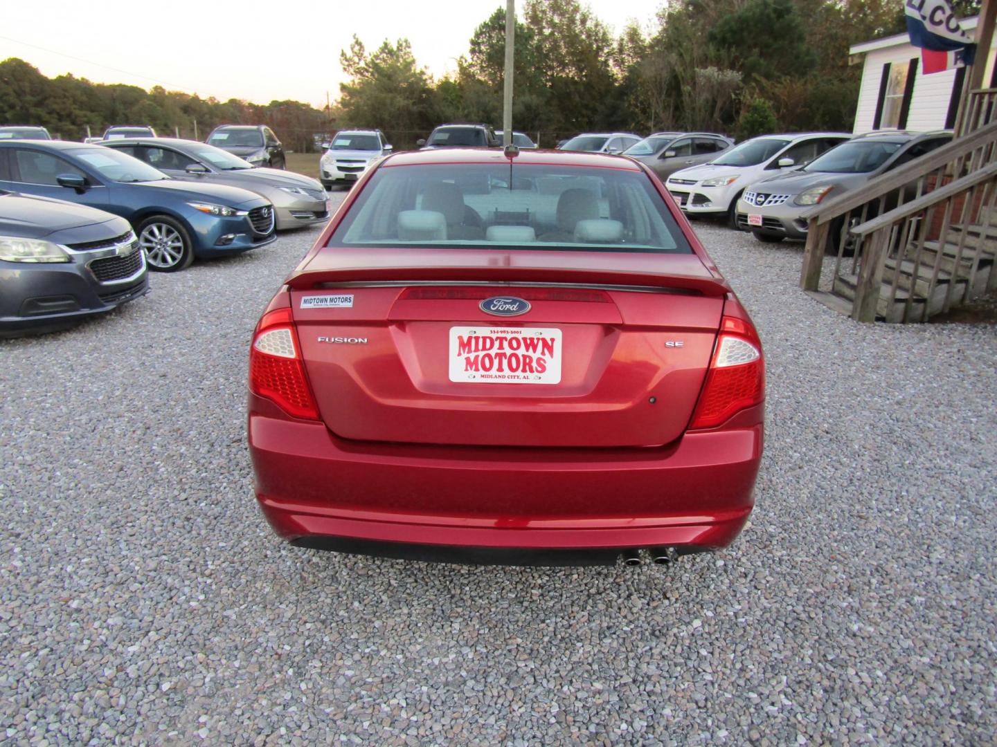 2011 Red Ford Fusion I4 SEL (3FAHP0JA9BR) with an 2.5L L4 DOHC 16V engine, Automatic transmission, located at 15016 S Hwy 231, Midland City, AL, 36350, (334) 983-3001, 31.306210, -85.495277 - Photo#6