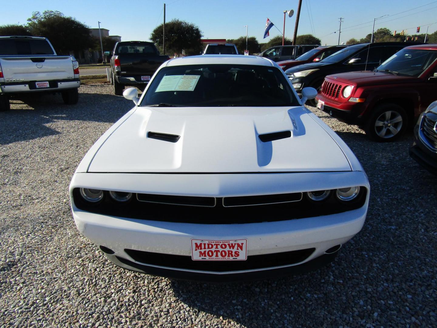 2016 White Dodge Challenger SXT (2C3CDZAG3GH) with an 3.6L V6 DOHC 24V engine, Automatic transmission, located at 15016 S Hwy 231, Midland City, AL, 36350, (334) 983-3001, 31.306210, -85.495277 - Photo#1