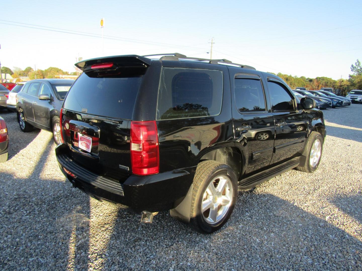 2012 Black Chevrolet Tahoe LS 2WD (1GNSCAE02CR) with an 5.3L V8 OHV 16V FFV engine, Automatic transmission, located at 15016 S Hwy 231, Midland City, AL, 36350, (334) 983-3001, 31.306210, -85.495277 - Photo#7
