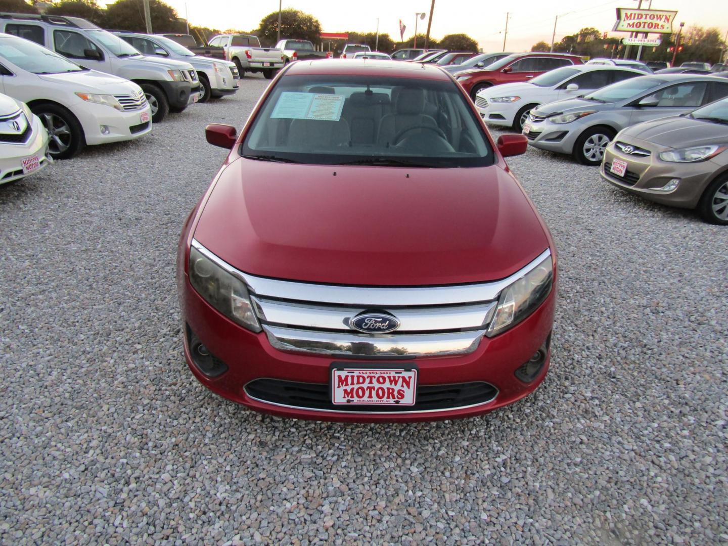 2010 Burgandy Ford Fusion SE (3FAHP0HA4AR) with an 2.5L L4 DOHC 16V engine, Automatic transmission, located at 15016 S Hwy 231, Midland City, AL, 36350, (334) 983-3001, 31.306210, -85.495277 - Photo#1