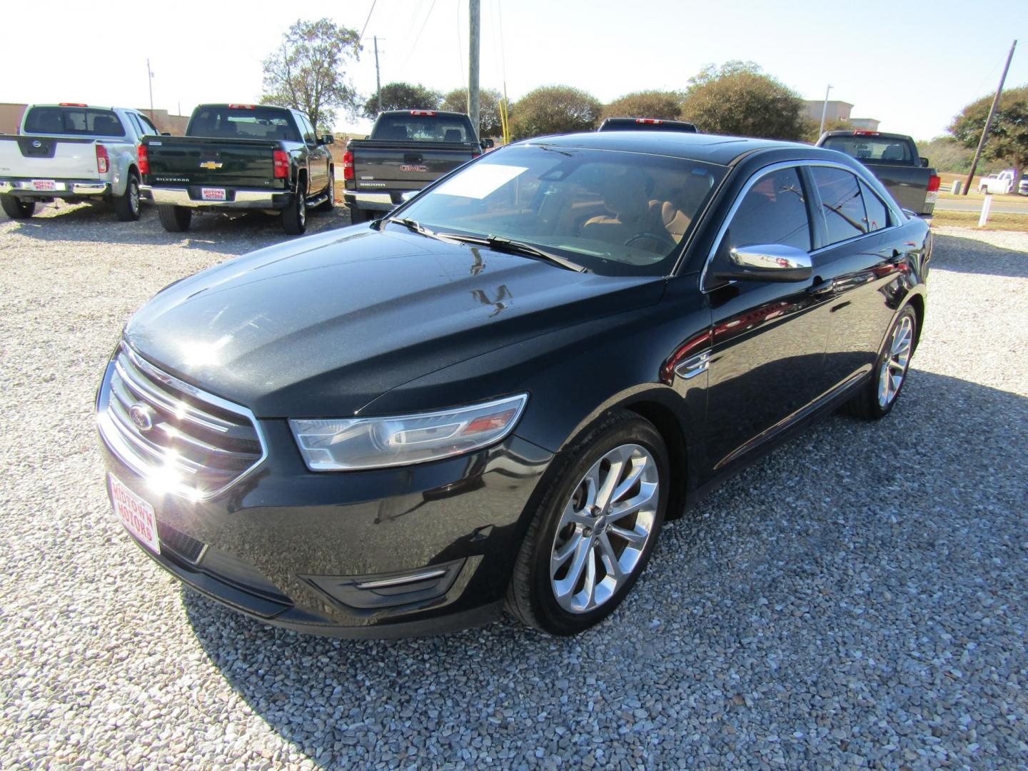2013 Black Ford Taurus Limited FWD (1FAHP2F80DG) with an 3.5L V6 DOHC 24V engine, Automatic transmission, located at 15016 S Hwy 231, Midland City, AL, 36350, (334) 983-3001, 31.306210, -85.495277 - Photo#2