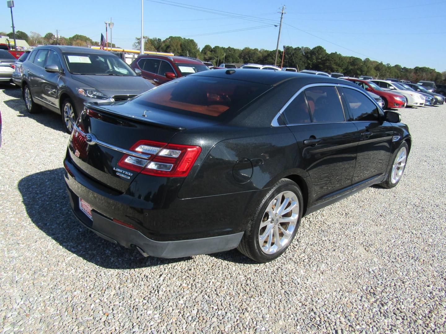 2013 Black Ford Taurus Limited FWD (1FAHP2F80DG) with an 3.5L V6 DOHC 24V engine, Automatic transmission, located at 15016 S Hwy 231, Midland City, AL, 36350, (334) 983-3001, 31.306210, -85.495277 - Photo#7