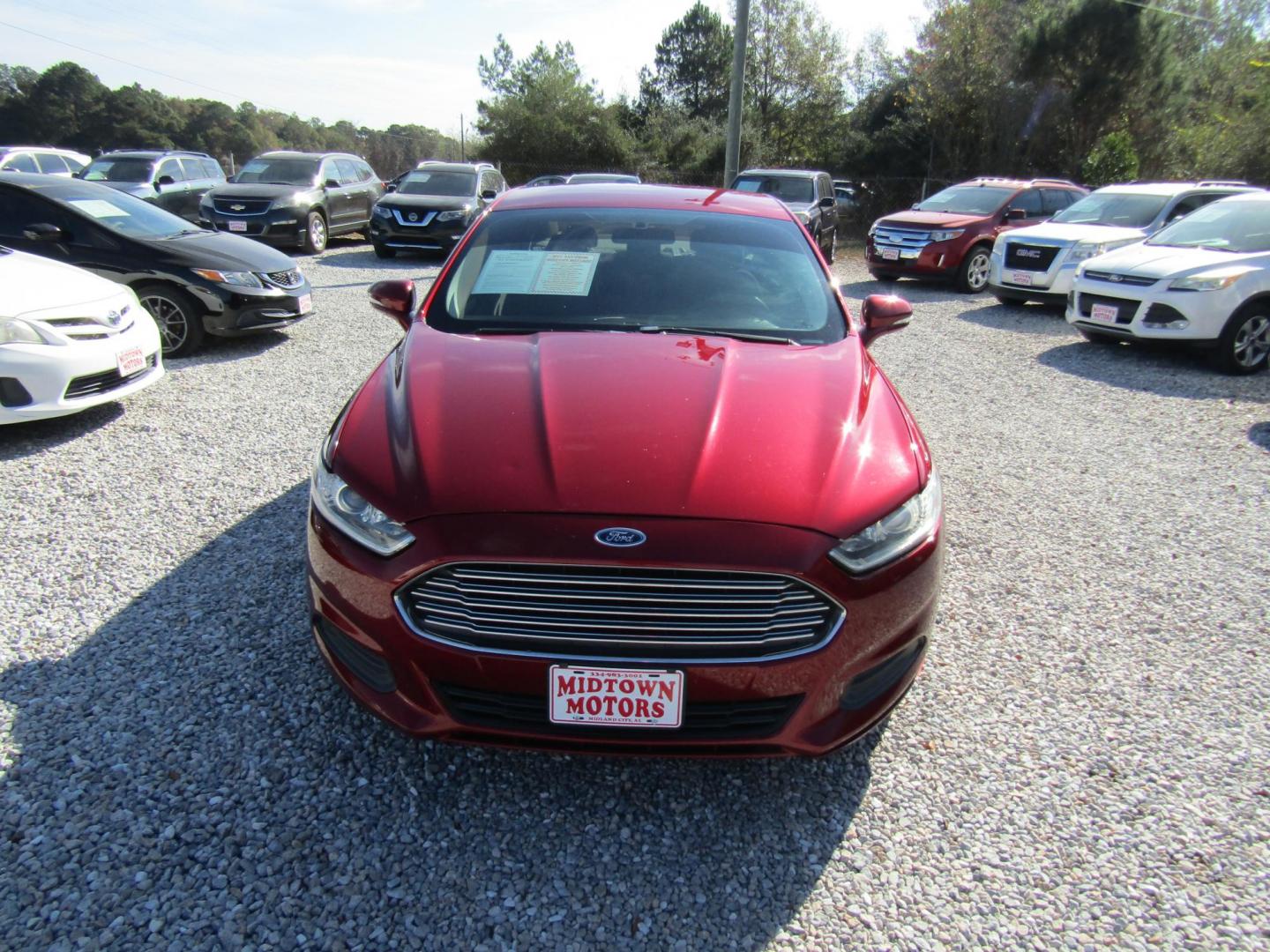 2014 Red Ford Fusion SE (1FA6P0H71E5) with an 2.5L L4 DOHC 16V engine, Automatic transmission, located at 15016 S Hwy 231, Midland City, AL, 36350, (334) 983-3001, 31.306210, -85.495277 - Photo#1