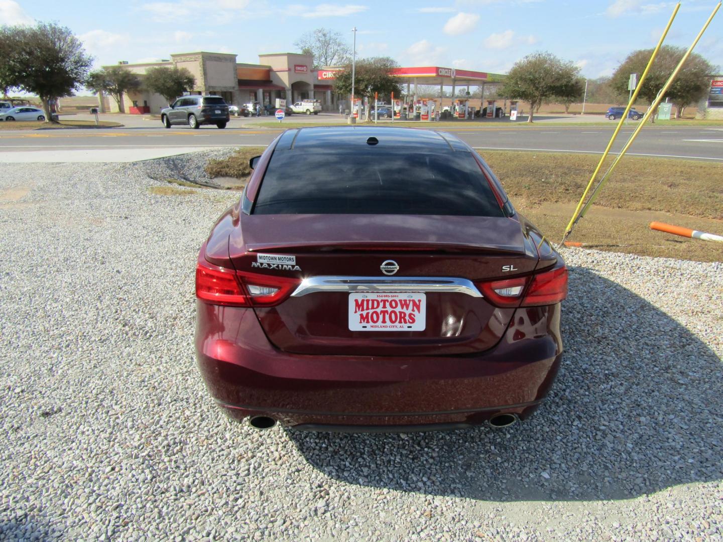 2016 Red Nissan Maxima 3.5 S (1N4AA6AP6GC) with an 3.5L V6 DOHC 24V engine, Automatic transmission, located at 15016 S Hwy 231, Midland City, AL, 36350, (334) 983-3001, 31.306210, -85.495277 - Photo#6