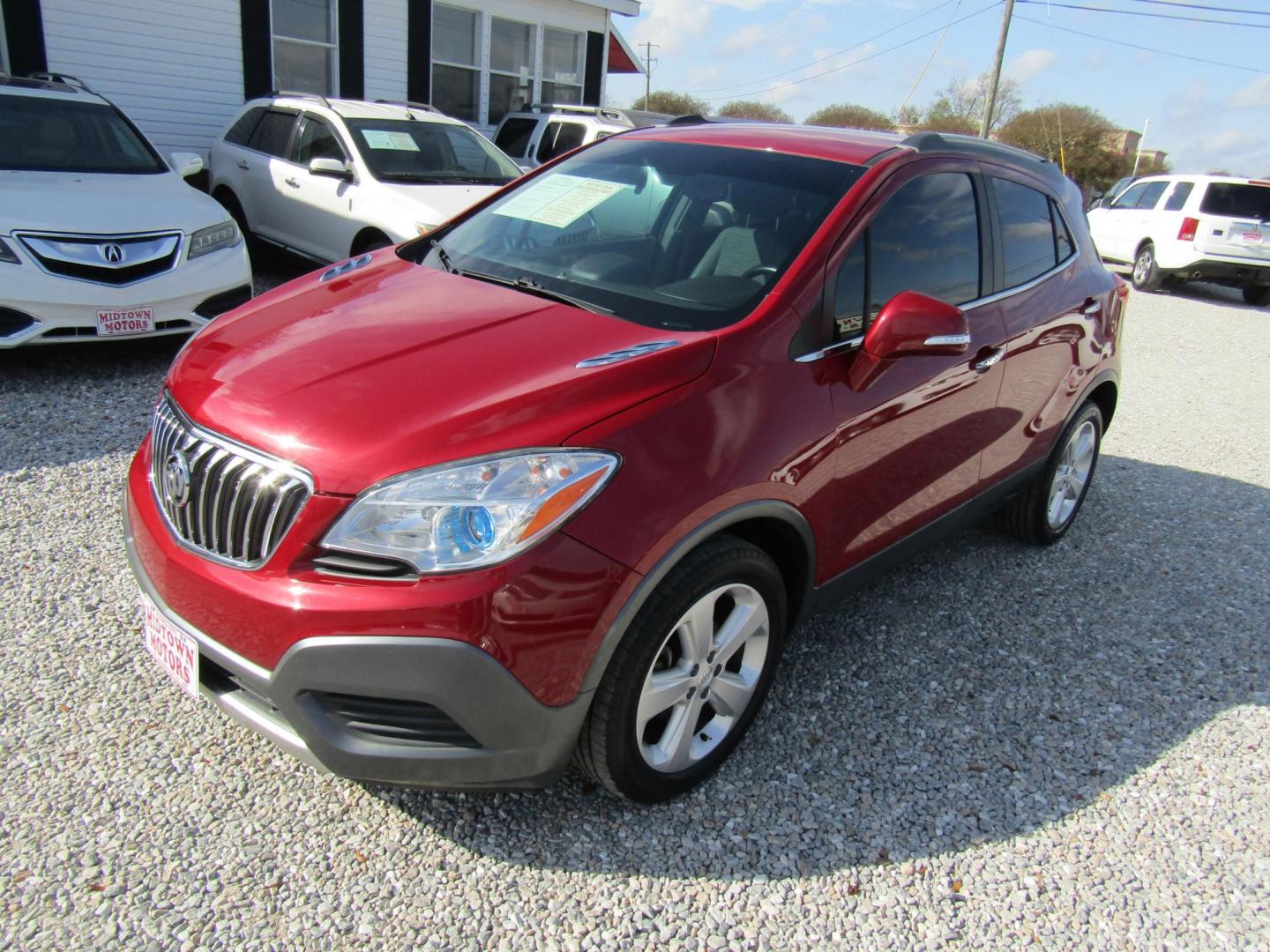 2015 Red Buick Encore Base FWD (KL4CJASB3FB) with an 1.4L L4 DOHC 16V TURBO engine, Automatic transmission, located at 15016 S Hwy 231, Midland City, AL, 36350, (334) 983-3001, 31.306210, -85.495277 - Photo#2