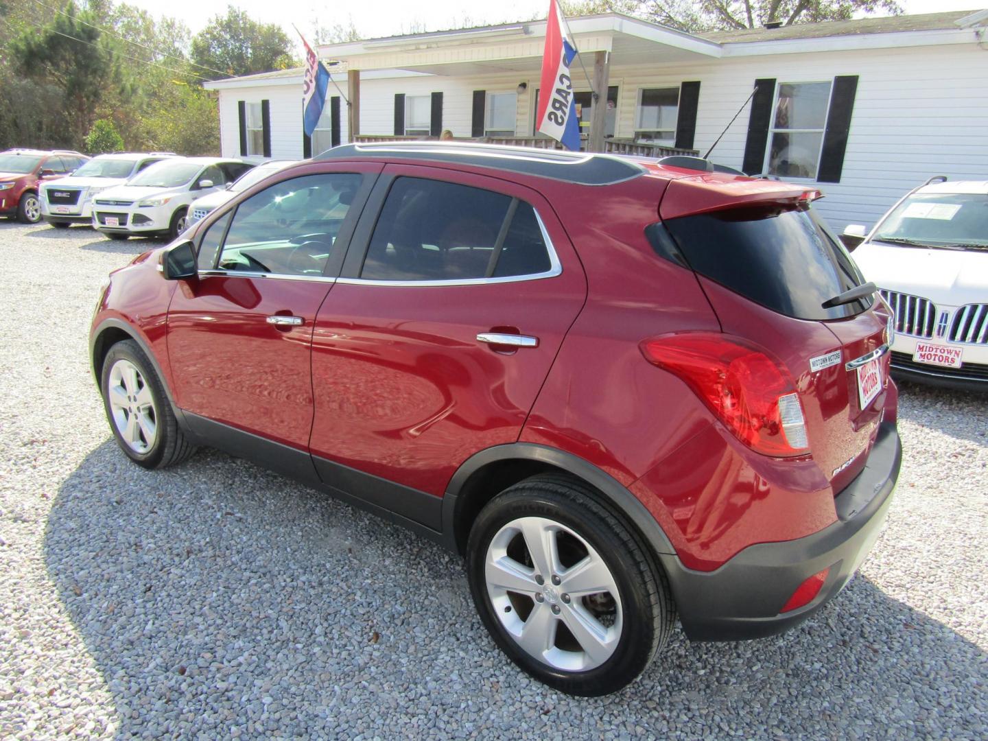 2015 Red Buick Encore Base FWD (KL4CJASB3FB) with an 1.4L L4 DOHC 16V TURBO engine, Automatic transmission, located at 15016 S Hwy 231, Midland City, AL, 36350, (334) 983-3001, 31.306210, -85.495277 - Photo#5
