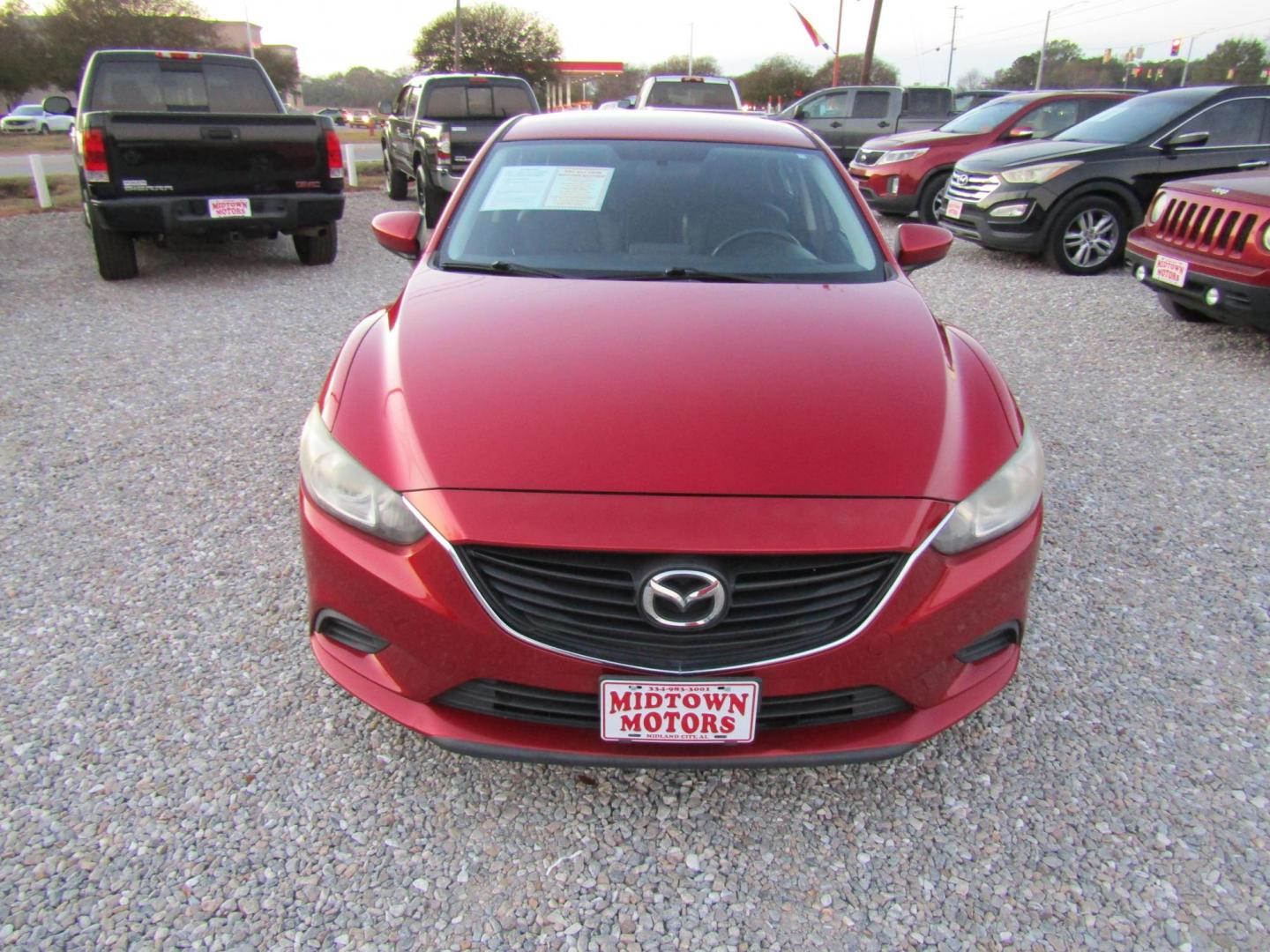2016 Red Mazda Mazda6 i Touring (JM1GJ1V55G1) with an 2.5L L4 DOHC 16V engine, Automatic transmission, located at 15016 S Hwy 231, Midland City, AL, 36350, (334) 983-3001, 31.306210, -85.495277 - Photo#1