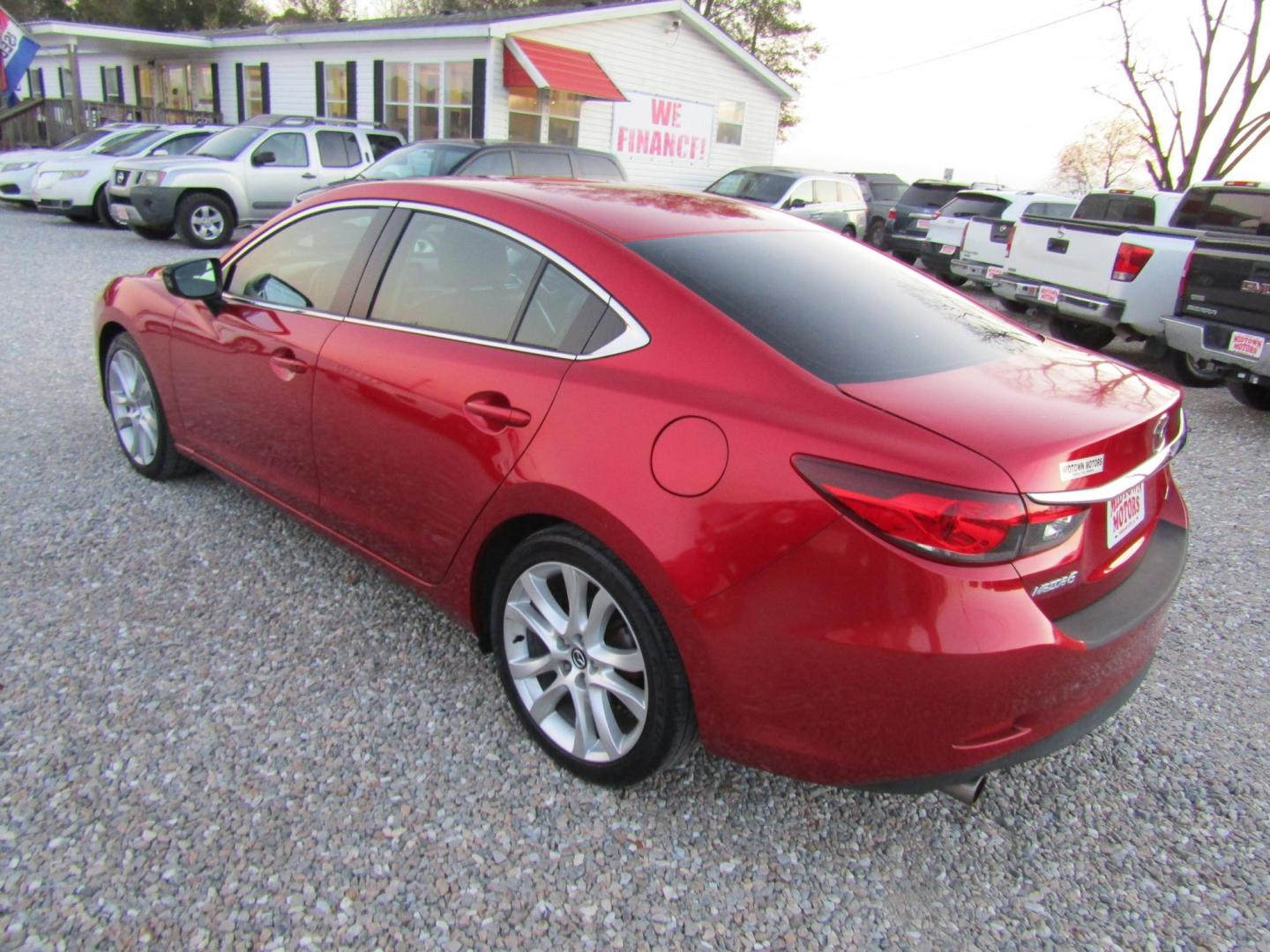 2016 Red Mazda Mazda6 i Touring (JM1GJ1V55G1) with an 2.5L L4 DOHC 16V engine, Automatic transmission, located at 15016 S Hwy 231, Midland City, AL, 36350, (334) 983-3001, 31.306210, -85.495277 - Photo#5