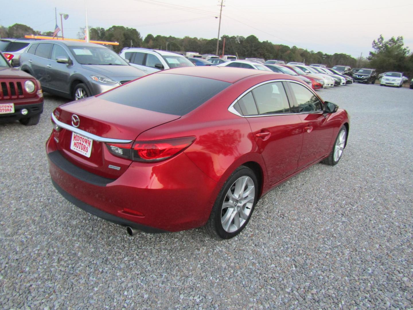 2016 Red Mazda Mazda6 i Touring (JM1GJ1V55G1) with an 2.5L L4 DOHC 16V engine, Automatic transmission, located at 15016 S Hwy 231, Midland City, AL, 36350, (334) 983-3001, 31.306210, -85.495277 - Photo#7