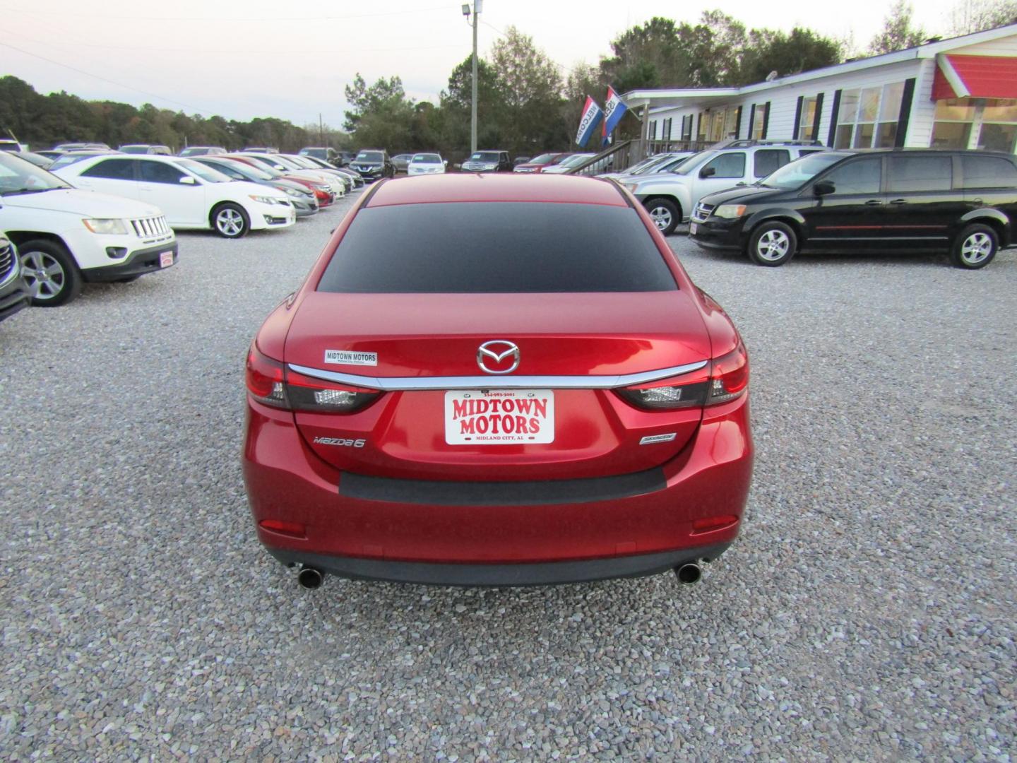 2016 Red Mazda Mazda6 i Touring (JM1GJ1V55G1) with an 2.5L L4 DOHC 16V engine, Automatic transmission, located at 15016 S Hwy 231, Midland City, AL, 36350, (334) 983-3001, 31.306210, -85.495277 - Photo#6