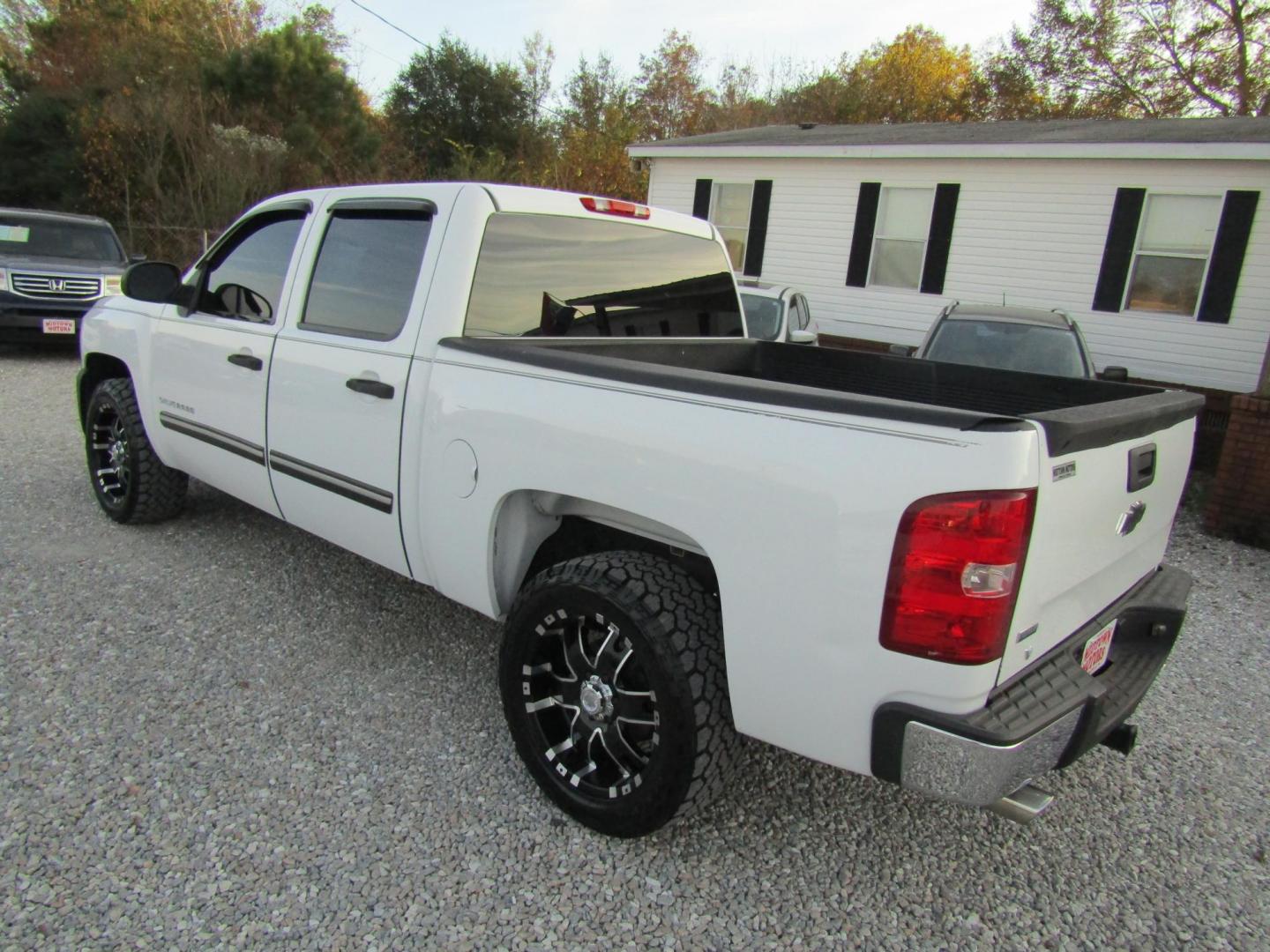 2012 White Chevrolet Silverado 1500 LT Ext. Cab 2WD (1GCRCSE02CZ) with an 5.3L V8 OHV 16V FFV engine, Automatic transmission, located at 15016 S Hwy 231, Midland City, AL, 36350, (334) 983-3001, 31.306210, -85.495277 - Photo#5