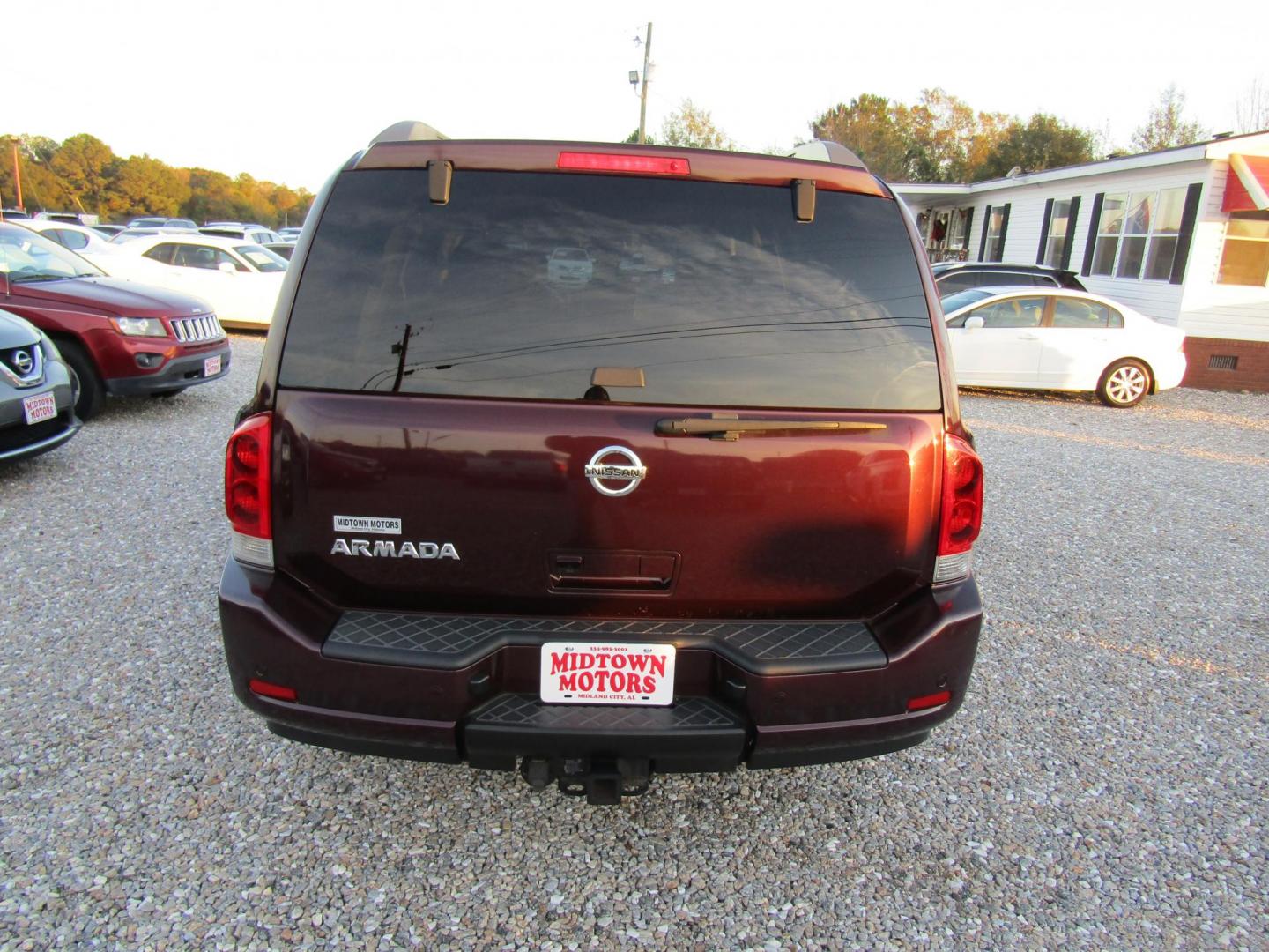 2014 Red Nissan Armada SL 2WD (5N1AA0ND3EN) with an 5.6L V8 DOHC 32V engine, Automatic transmission, located at 15016 S Hwy 231, Midland City, AL, 36350, (334) 983-3001, 31.306210, -85.495277 - Photo#6