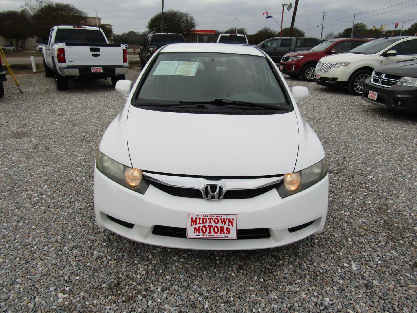 2010 White Honda Civic LX Sedan 5-Speed AT (2HGFA1F5XAH) with an 1.8L L4 SOHC 16V engine, Automatic transmission, located at 15016 S Hwy 231, Midland City, AL, 36350, (334) 983-3001, 31.306210, -85.495277 - Photo#1
