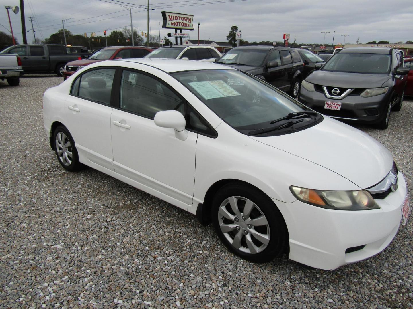 2010 White Honda Civic LX Sedan 5-Speed AT (2HGFA1F5XAH) with an 1.8L L4 SOHC 16V engine, Automatic transmission, located at 15016 S Hwy 231, Midland City, AL, 36350, (334) 983-3001, 31.306210, -85.495277 - Photo#0
