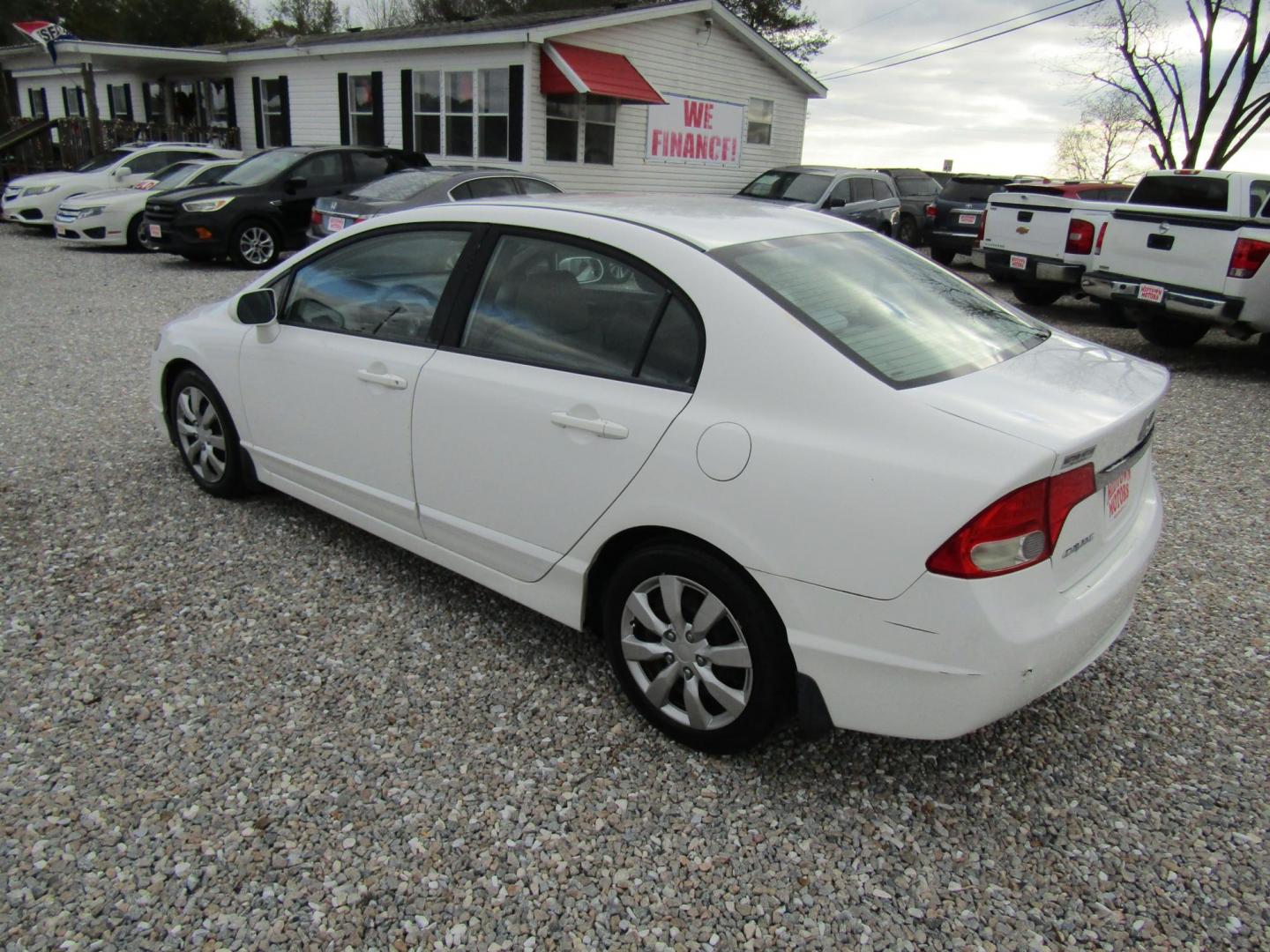 2010 White Honda Civic LX Sedan 5-Speed AT (2HGFA1F5XAH) with an 1.8L L4 SOHC 16V engine, Automatic transmission, located at 15016 S Hwy 231, Midland City, AL, 36350, (334) 983-3001, 31.306210, -85.495277 - Photo#5