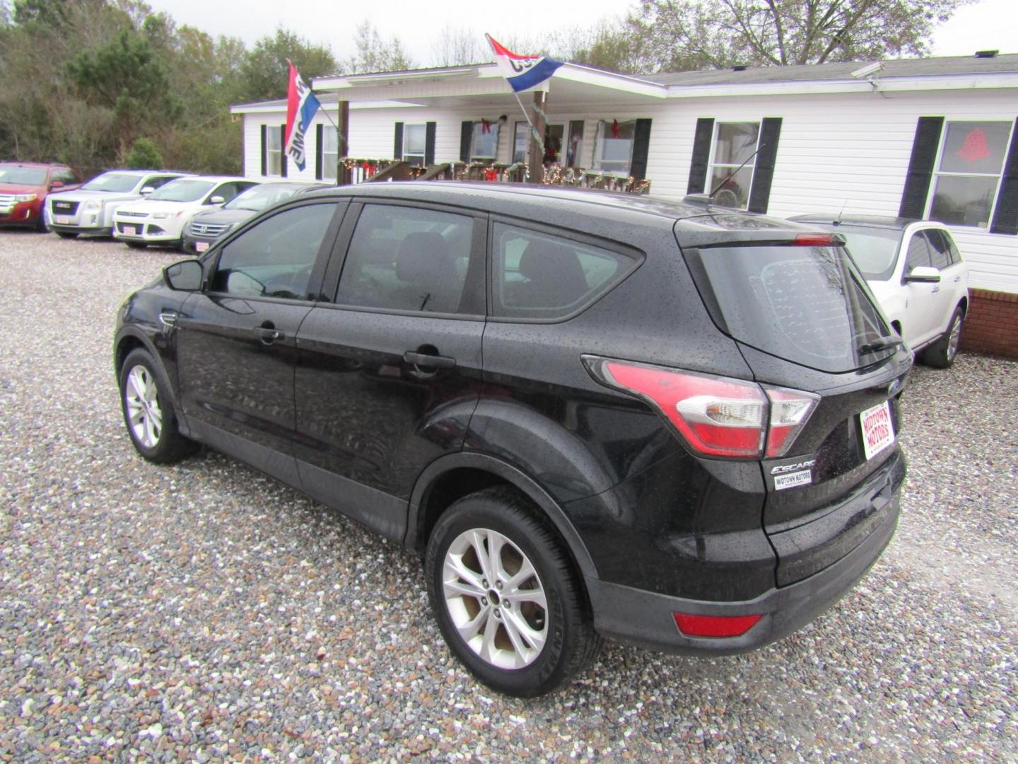 2017 Black Ford Escape S FWD (1FMCU0F75HU) with an 2.5L L4 DOHC 16V engine, Automatic transmission, located at 15016 S Hwy 231, Midland City, AL, 36350, (334) 983-3001, 31.306210, -85.495277 - Photo#5