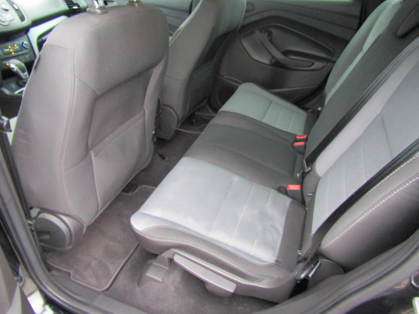 2017 Black Ford Escape S FWD (1FMCU0F75HU) with an 2.5L L4 DOHC 16V engine, Automatic transmission, located at 15016 S Hwy 231, Midland City, AL, 36350, (334) 983-3001, 31.306210, -85.495277 - Photo#4