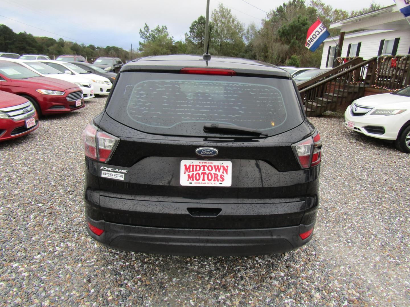 2017 Black Ford Escape S FWD (1FMCU0F75HU) with an 2.5L L4 DOHC 16V engine, Automatic transmission, located at 15016 S Hwy 231, Midland City, AL, 36350, (334) 983-3001, 31.306210, -85.495277 - Photo#6
