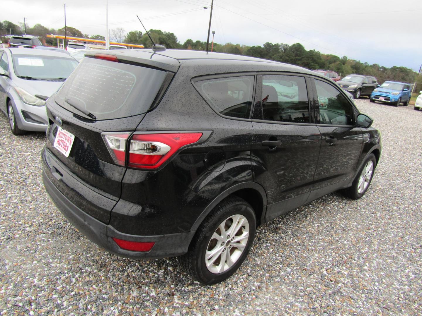 2017 Black Ford Escape S FWD (1FMCU0F75HU) with an 2.5L L4 DOHC 16V engine, Automatic transmission, located at 15016 S Hwy 231, Midland City, AL, 36350, (334) 983-3001, 31.306210, -85.495277 - Photo#7