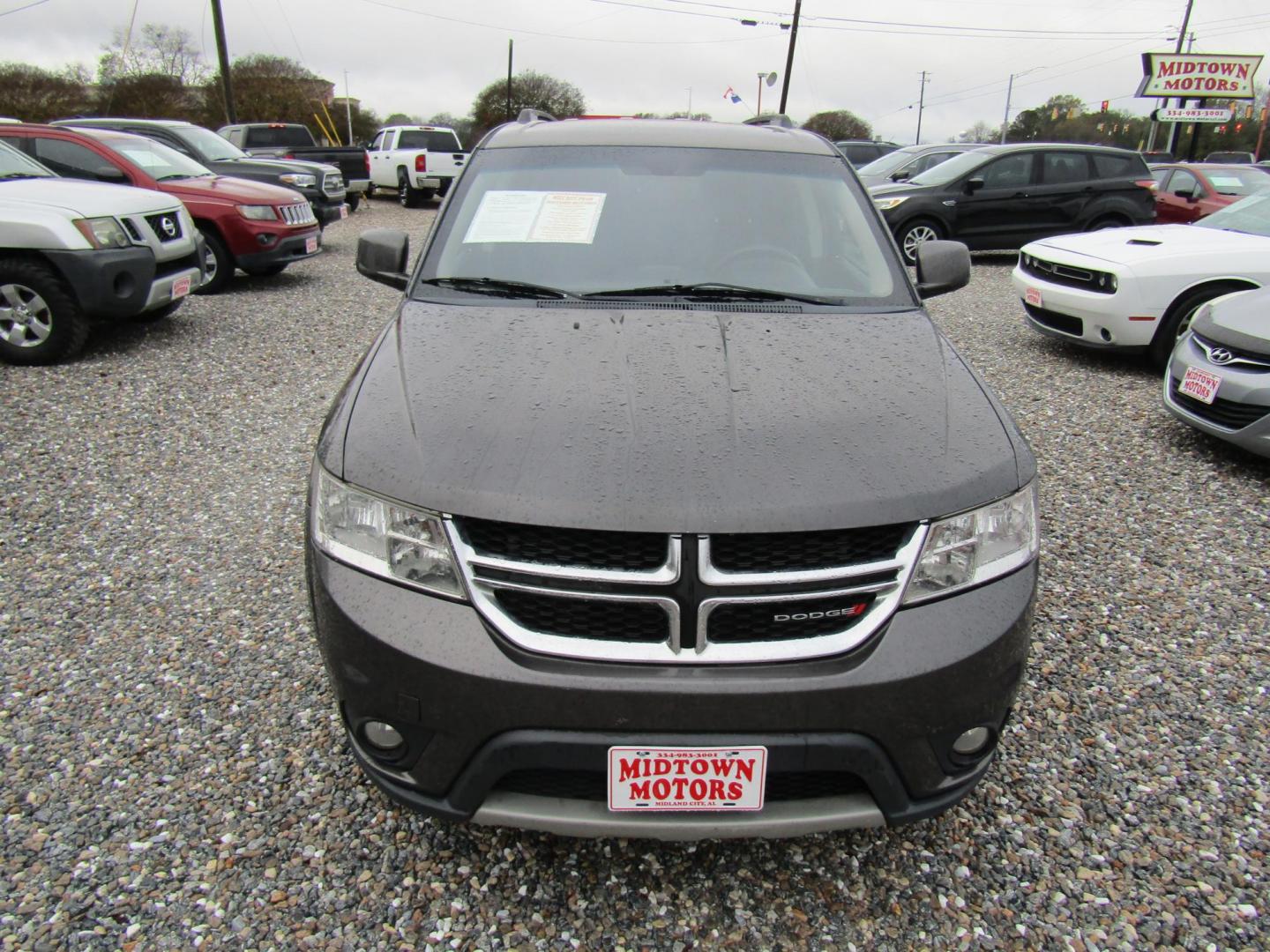 2016 Gray Dodge Journey SXT (3C4PDCBG5GT) with an 3.6L V6 DOHC 24V engine, Automatic transmission, located at 15016 S Hwy 231, Midland City, AL, 36350, (334) 983-3001, 31.306210, -85.495277 - Photo#1