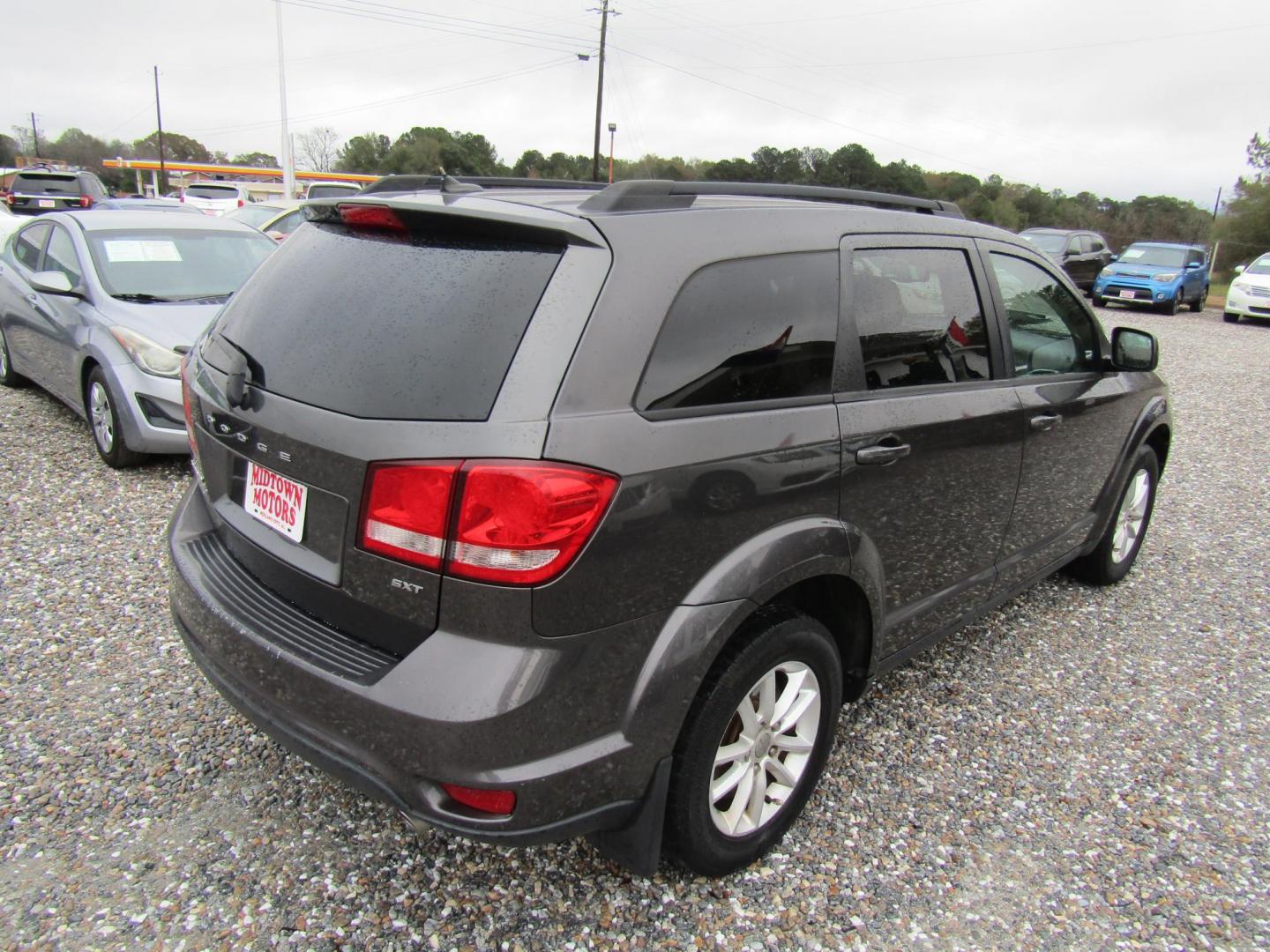 2016 Gray Dodge Journey SXT (3C4PDCBG5GT) with an 3.6L V6 DOHC 24V engine, Automatic transmission, located at 15016 S Hwy 231, Midland City, AL, 36350, (334) 983-3001, 31.306210, -85.495277 - Photo#7