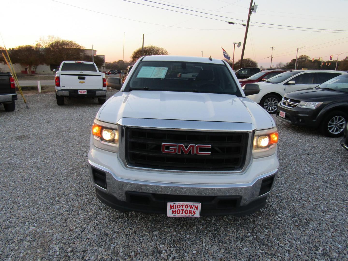 2014 White GMC Sierra 1500 Base Double Cab 2WD (1GTR1TEH7EZ) with an 4.3L V6 OHV 12V engine, Automatic transmission, located at 15016 S Hwy 231, Midland City, AL, 36350, (334) 983-3001, 31.306210, -85.495277 - Photo#1