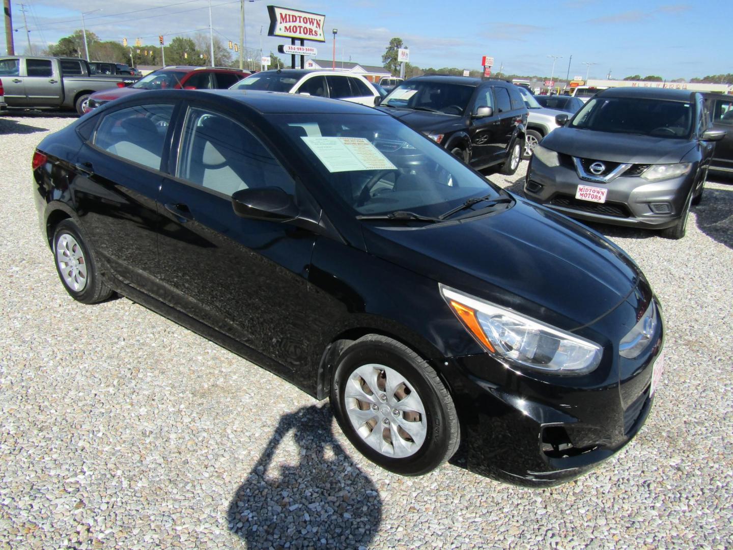 2017 Black Hyundai Accent SE 4-Door 6M (KMHCT4AE4HU) with an 1.6L L4 DOHC 16V engine, Automatic transmission, located at 15016 S Hwy 231, Midland City, AL, 36350, (334) 983-3001, 31.306210, -85.495277 - Photo#0