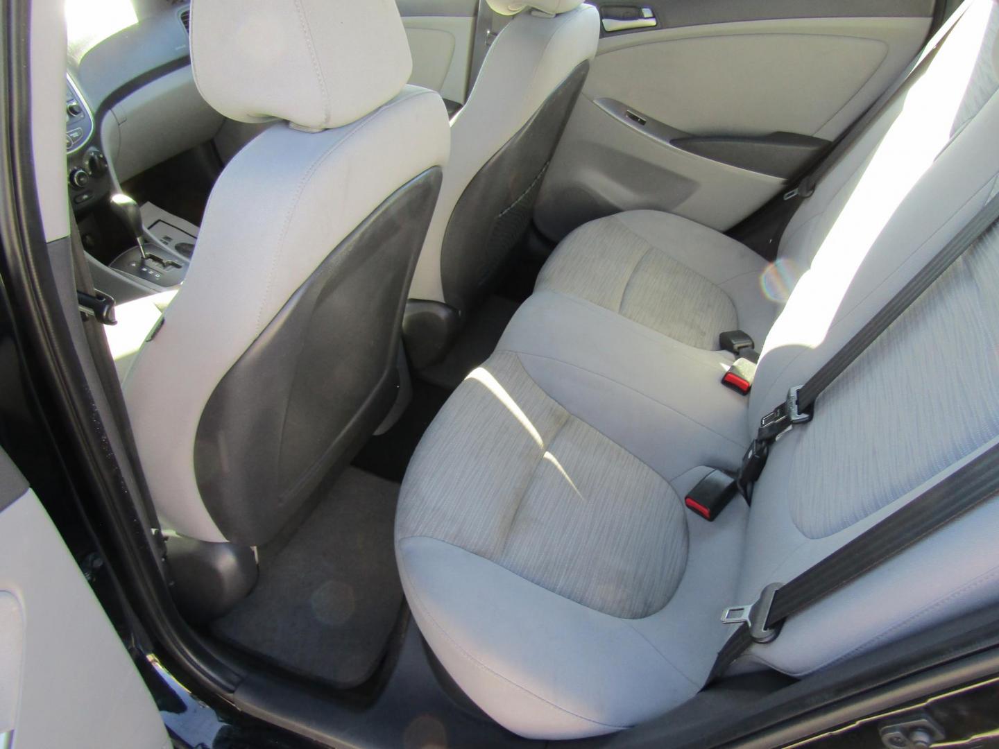 2017 Black Hyundai Accent SE 4-Door 6M (KMHCT4AE4HU) with an 1.6L L4 DOHC 16V engine, Automatic transmission, located at 15016 S Hwy 231, Midland City, AL, 36350, (334) 983-3001, 31.306210, -85.495277 - Photo#4