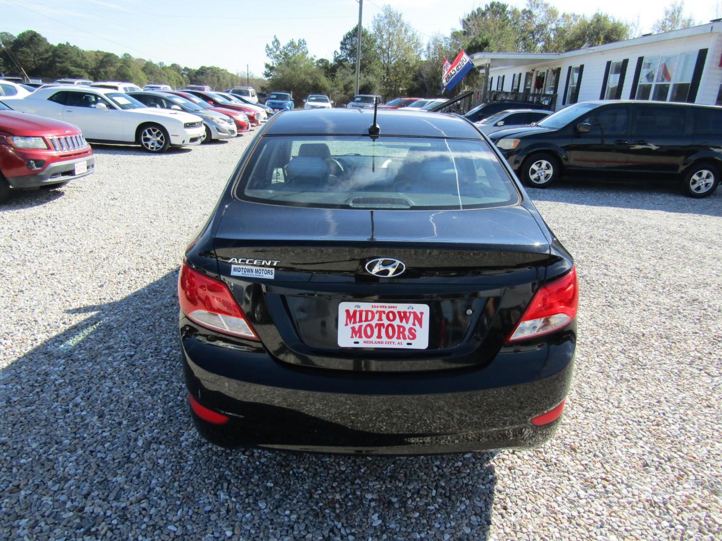 2017 Black Hyundai Accent SE 4-Door 6M (KMHCT4AE4HU) with an 1.6L L4 DOHC 16V engine, Automatic transmission, located at 15016 S Hwy 231, Midland City, AL, 36350, (334) 983-3001, 31.306210, -85.495277 - Photo#6