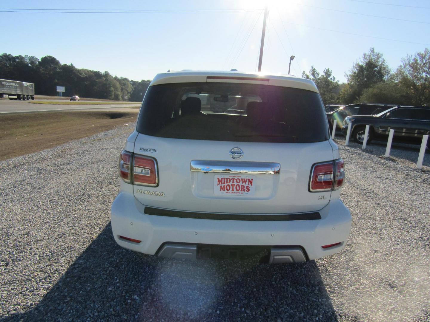 2017 White Nissan Armada SL 2WD (JN8AY2ND6H9) with an 5.6L V8 DOHC 32V engine, Automatic transmission, located at 15016 S Hwy 231, Midland City, AL, 36350, (334) 983-3001, 31.306210, -85.495277 - Photo#4