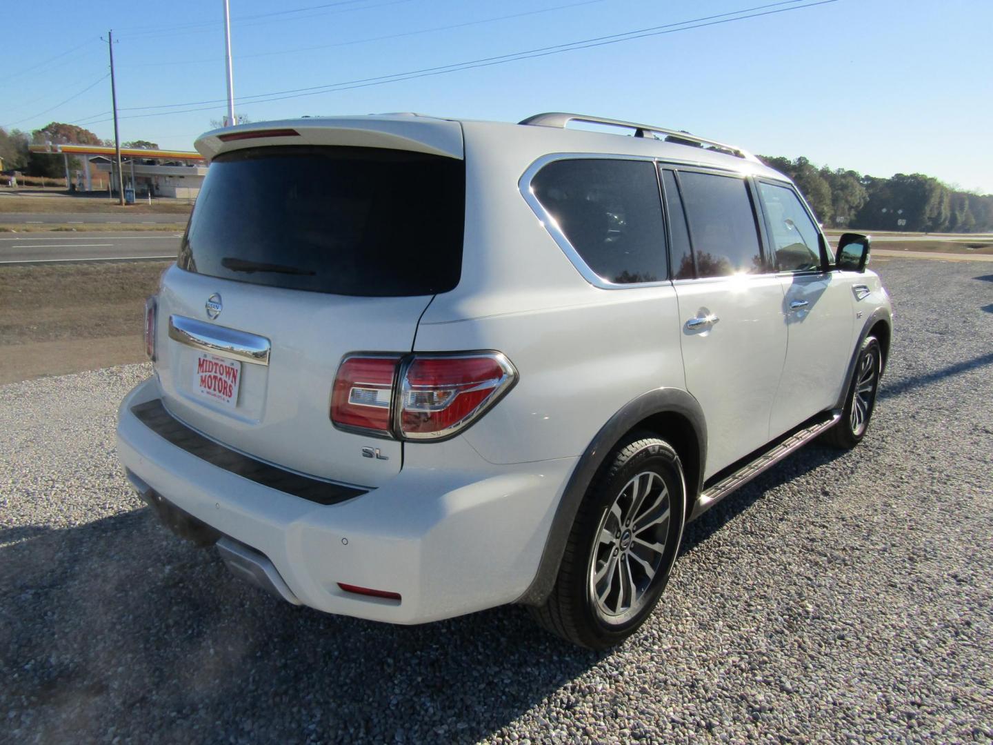 2017 White Nissan Armada SL 2WD (JN8AY2ND6H9) with an 5.6L V8 DOHC 32V engine, Automatic transmission, located at 15016 S Hwy 231, Midland City, AL, 36350, (334) 983-3001, 31.306210, -85.495277 - Photo#5
