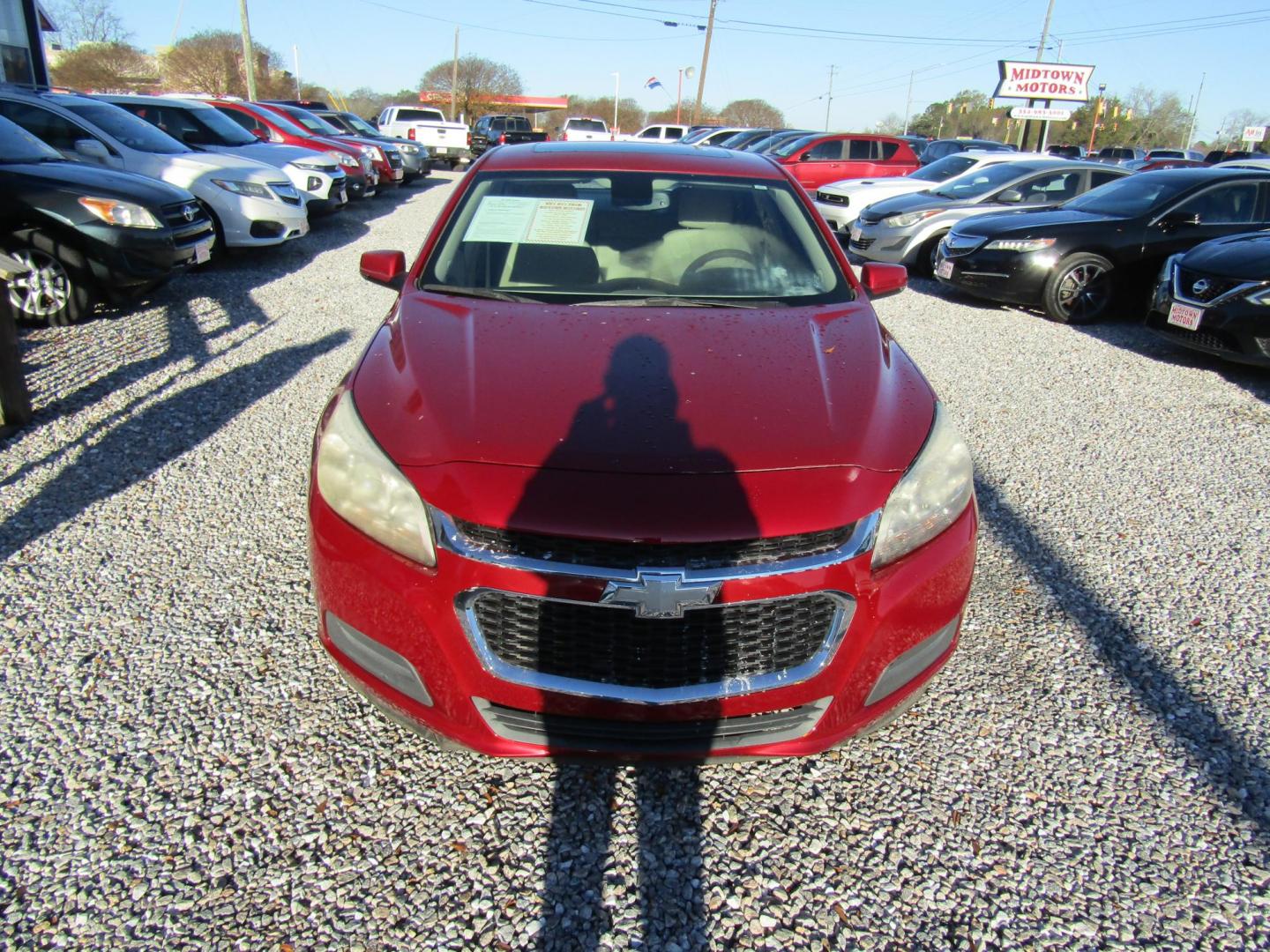 2014 Red Chevrolet Malibu 1LT (1G11C5SL3EF) with an 2.5L L4 DOHC 16V engine, Automatic transmission, located at 15016 S Hwy 231, Midland City, AL, 36350, (334) 983-3001, 31.306210, -85.495277 - Photo#1