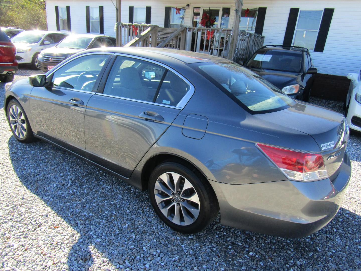 2009 Silver Honda Accord LX Sedan AT (1HGCP26309A) with an 2.4L L4 DOHC 16V engine, Automatic transmission, located at 15016 S Hwy 231, Midland City, AL, 36350, (334) 983-3001, 31.306210, -85.495277 - Photo#4