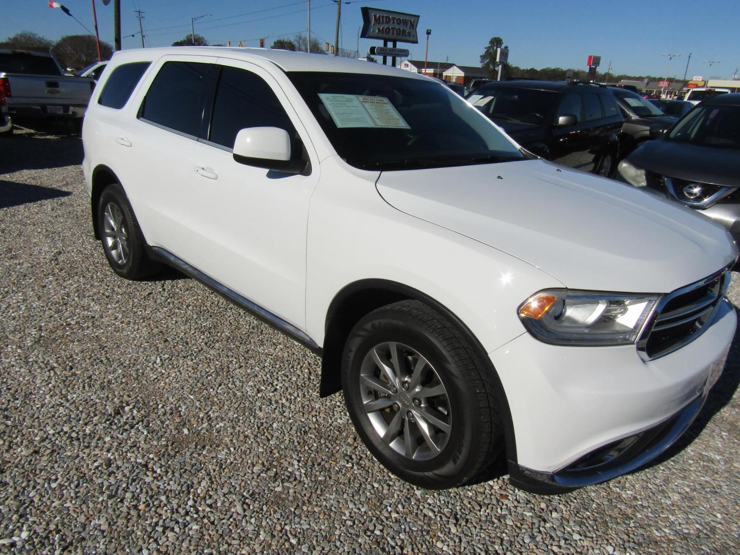 2017 White Dodge Durango SXT RWD (1C4RDHAG5HC) with an 3.6L V6 DOHC 24V engine, 8A transmission, located at 15016 S Hwy 231, Midland City, AL, 36350, (334) 983-3001, 31.306210, -85.495277 - Photo#0