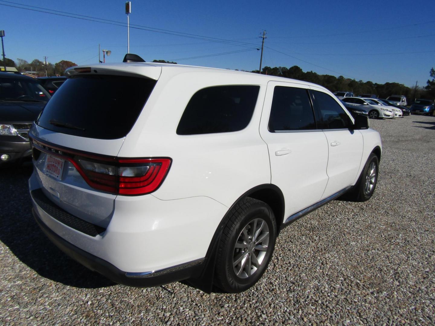 2017 White Dodge Durango SXT RWD (1C4RDHAG5HC) with an 3.6L V6 DOHC 24V engine, 8A transmission, located at 15016 S Hwy 231, Midland City, AL, 36350, (334) 983-3001, 31.306210, -85.495277 - Photo#6
